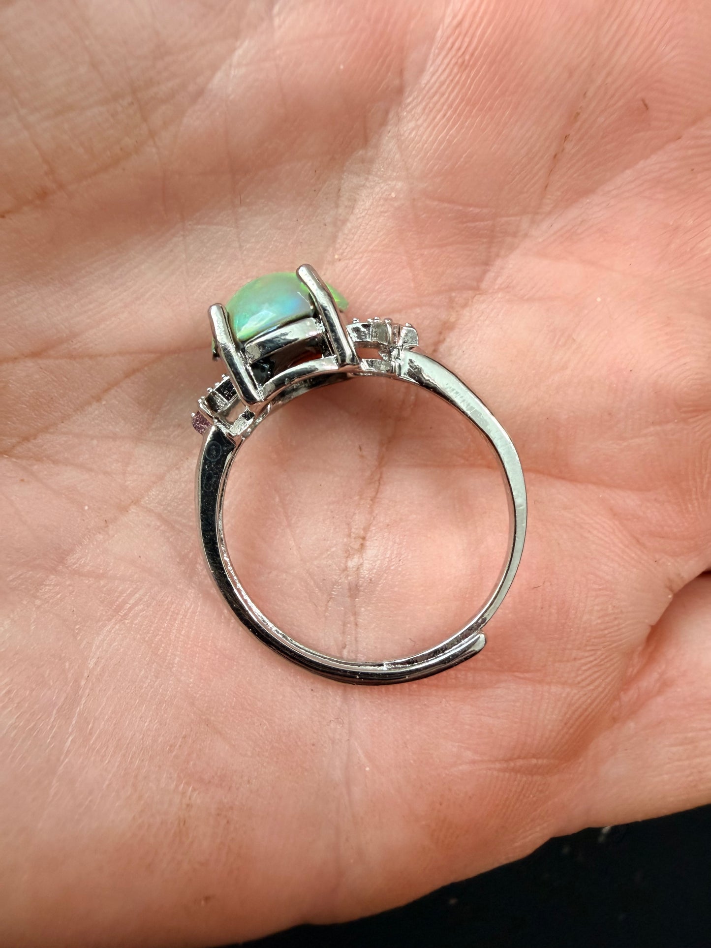 Ethiopian opal adjustable ring with green and orange flash