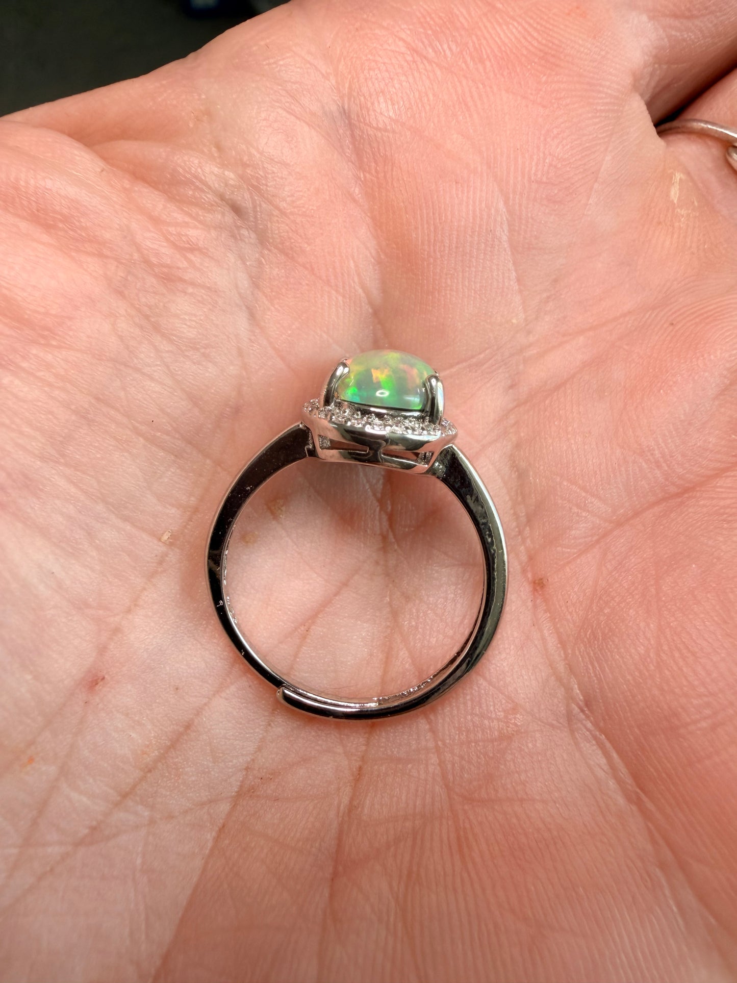 2.2 carat Ethiopian opal adjustable ring dark base