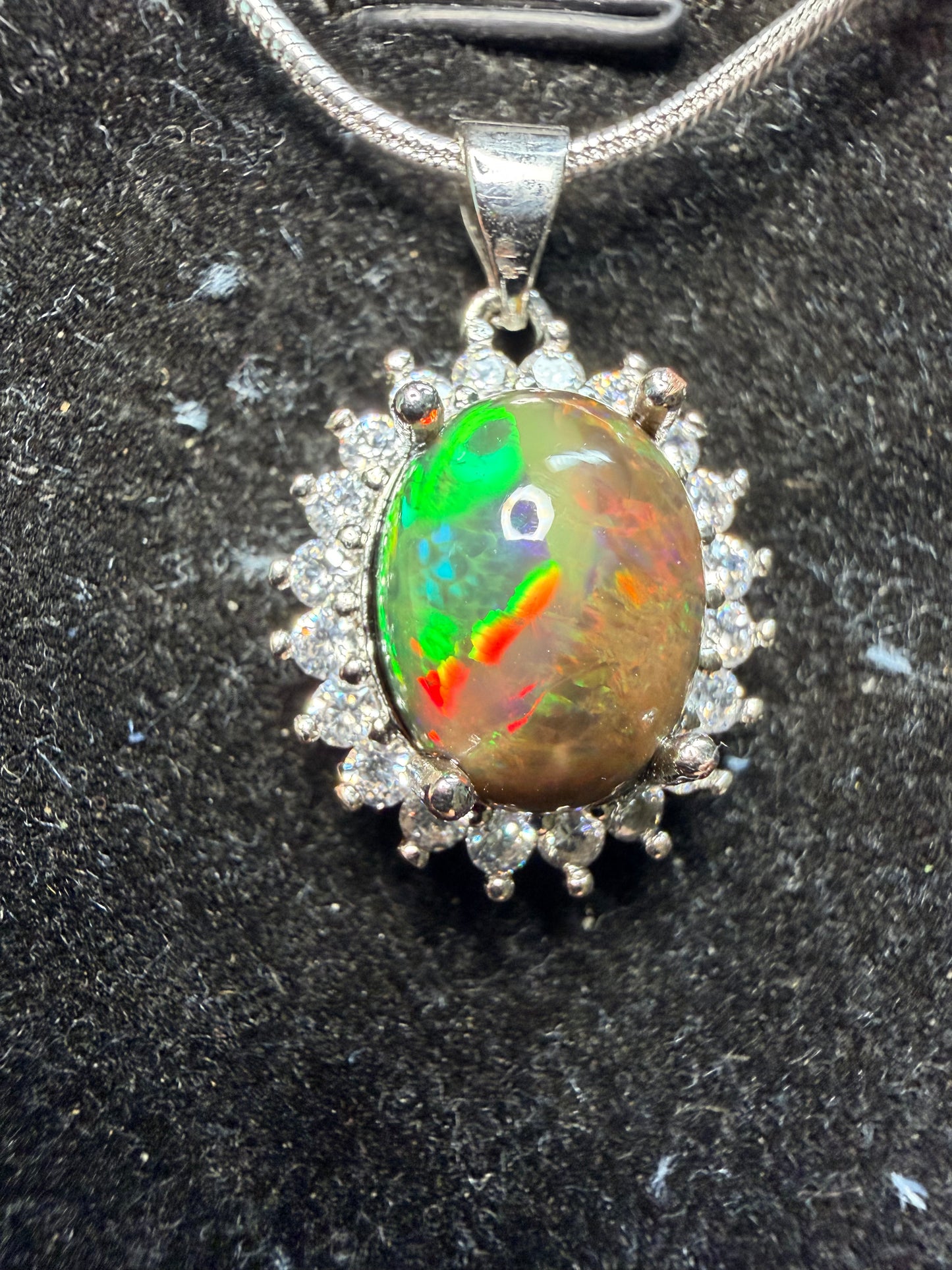 3.4 carat Ethiopian opal pendant and chain unique pattern