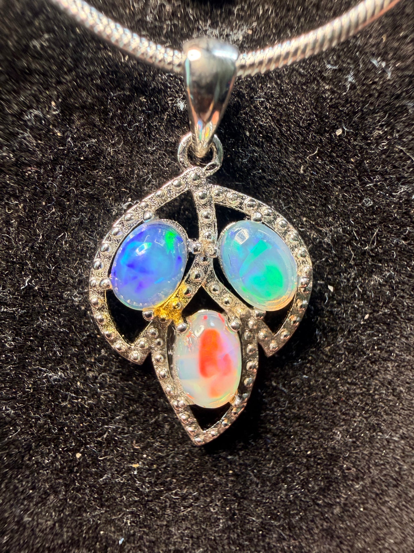 3 stone Ethiopian opal pendant with chain