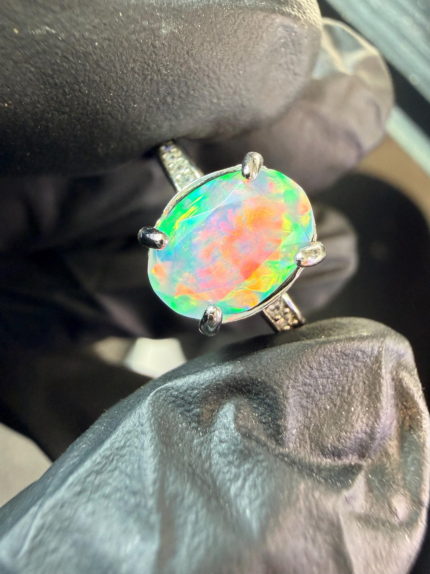 Faceted 1.2 carat Ethiopian opal adjustable ring