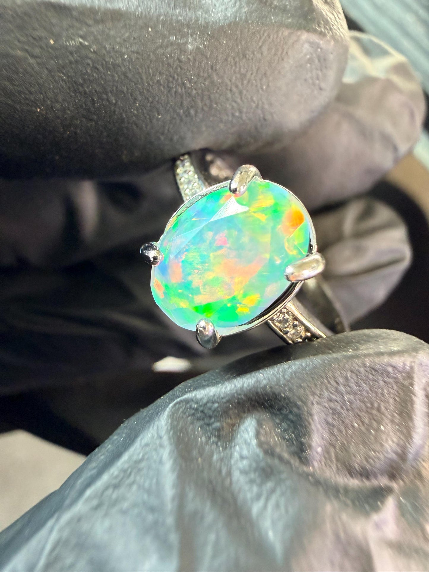 Faceted 1.2 carat Ethiopian opal adjustable ring