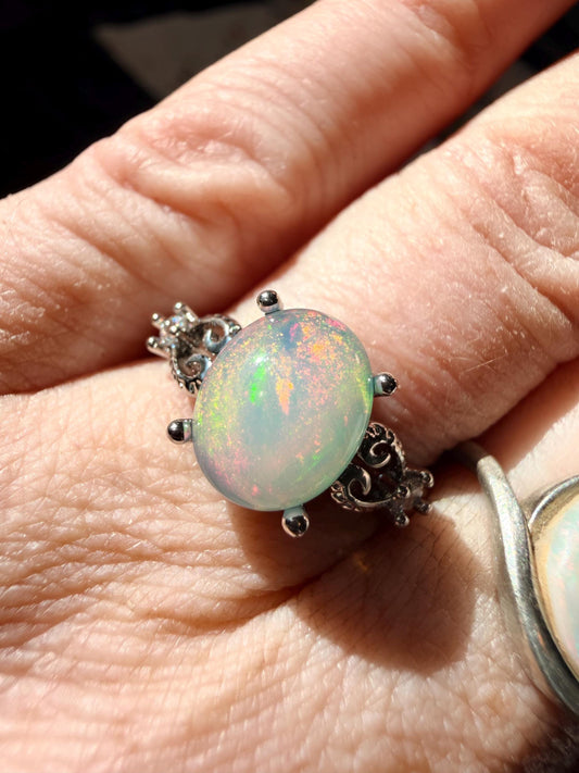 1.8 carat Ethiopian opal adjustable ring with pink/green flash