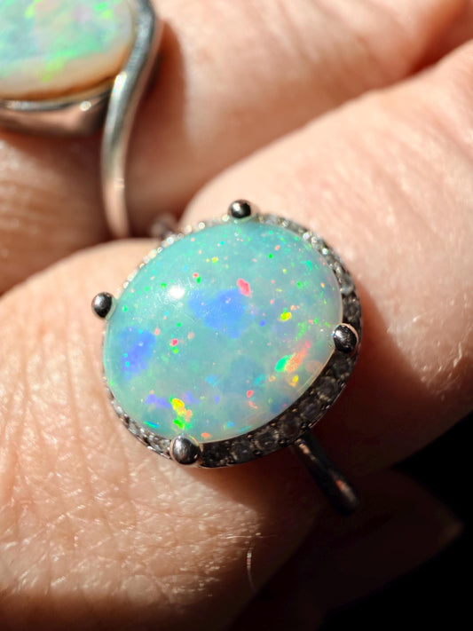 2.4 carat Ethiopian opal adjustable ring with pinfire and confetti pattern