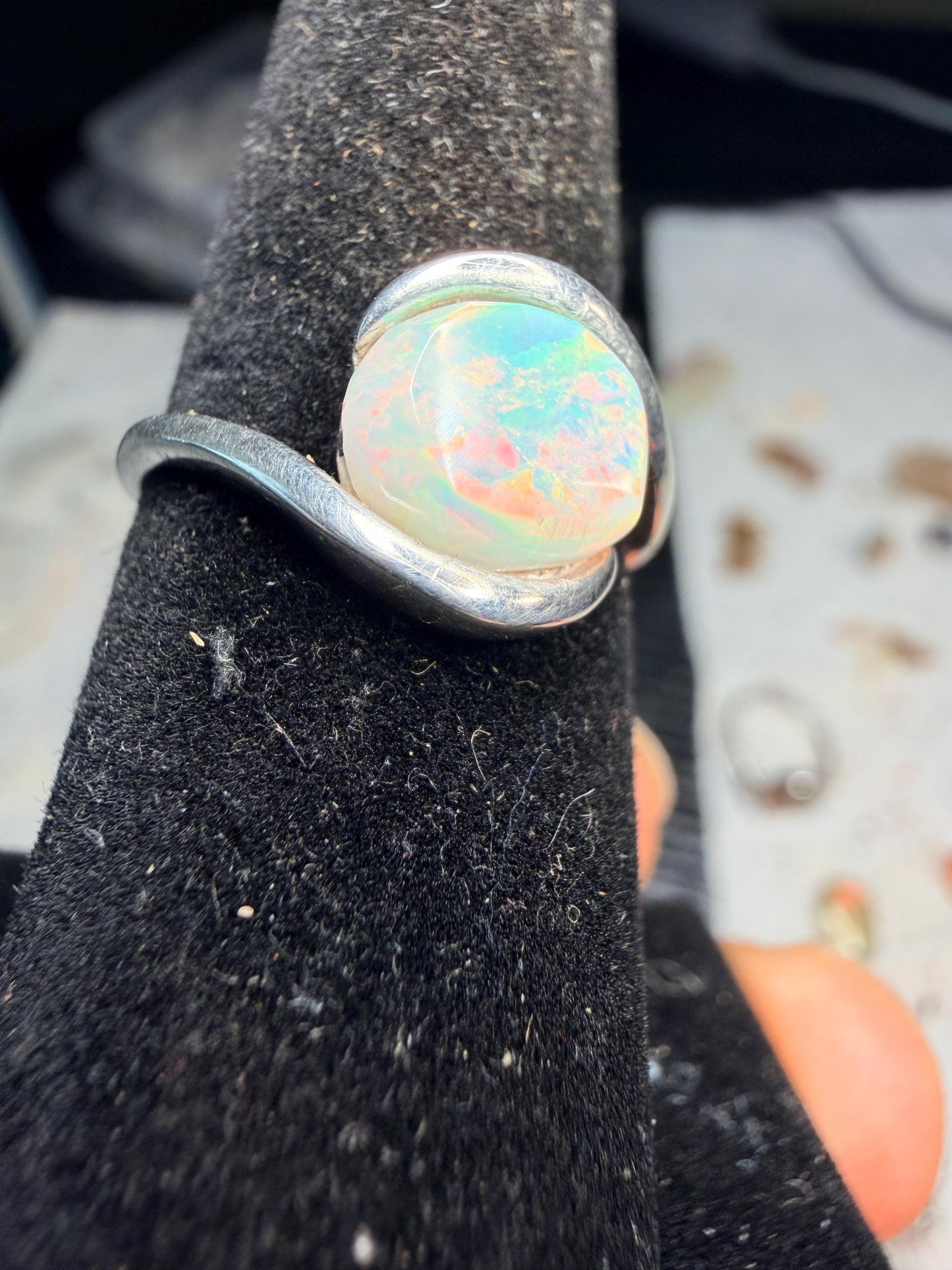 Small but flashy 1.5 carat Ethiopian opal adjustable ring