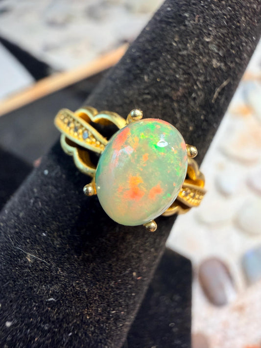 1.2 carat Ethiopian opal adjustable ring in 18kt gold plated brass green red flash