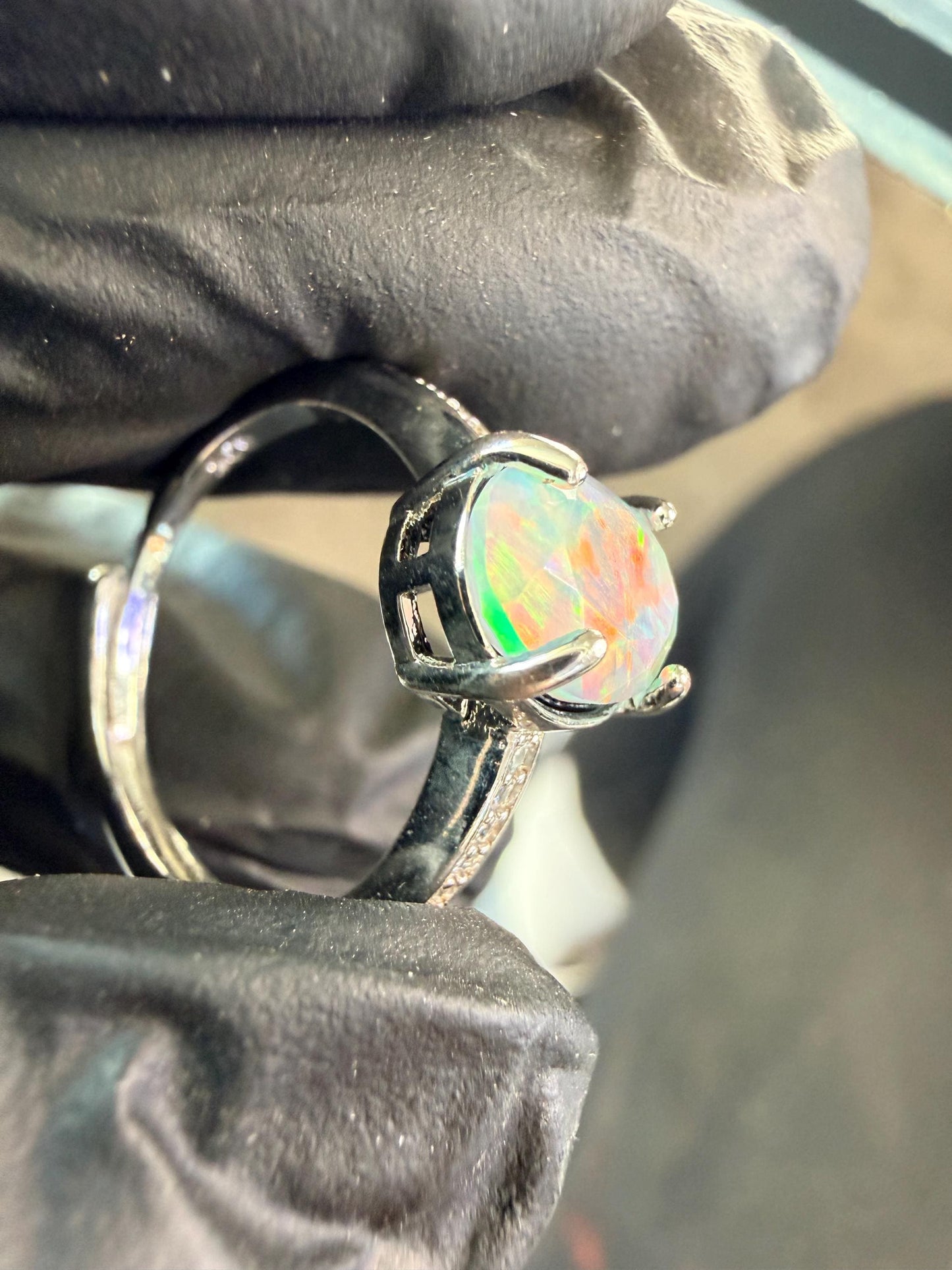 Faceted 1.2 carat Ethiopian opal adjustable ring