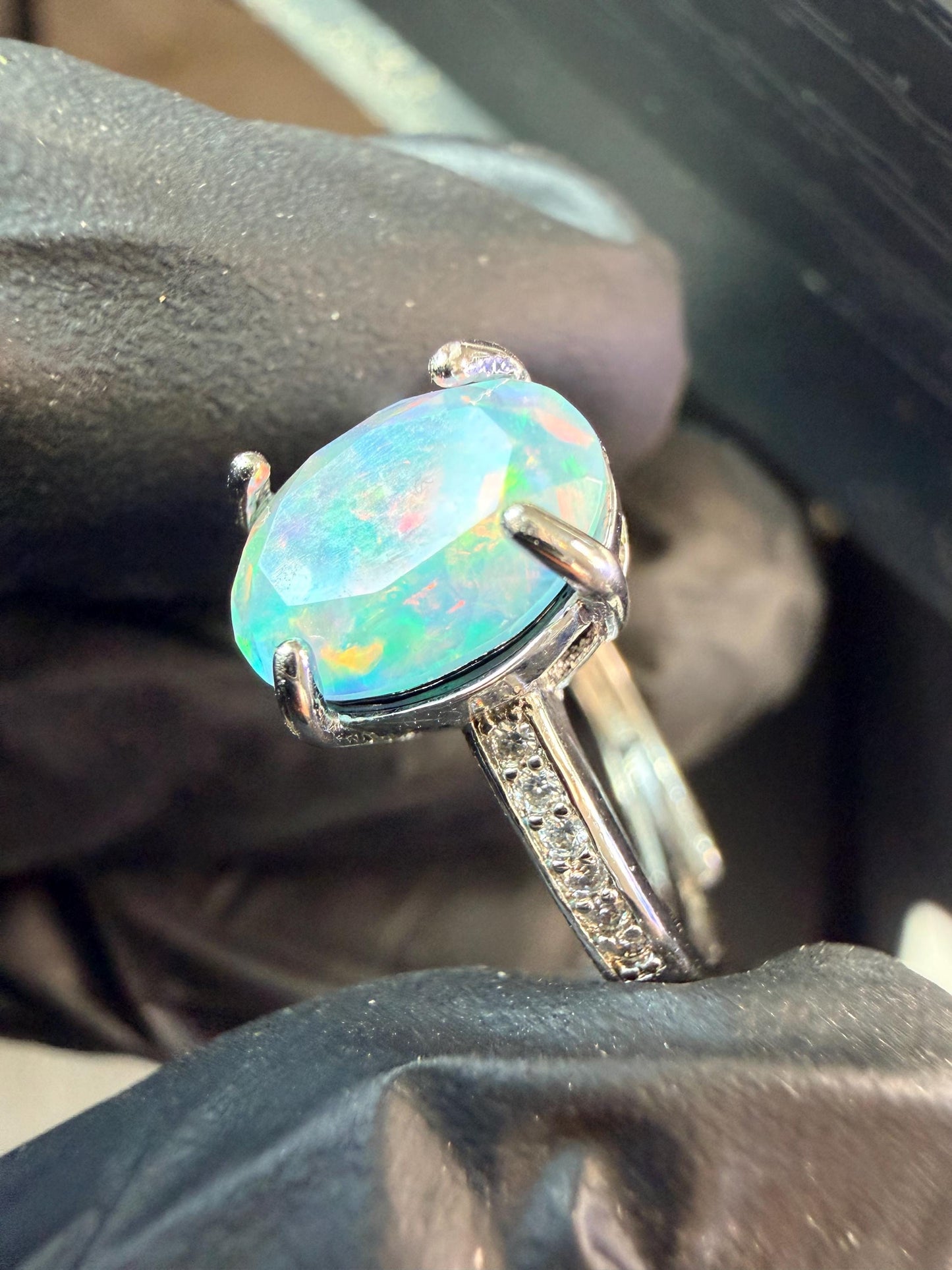 Faceted 1.2 carat Ethiopian opal adjustable ring