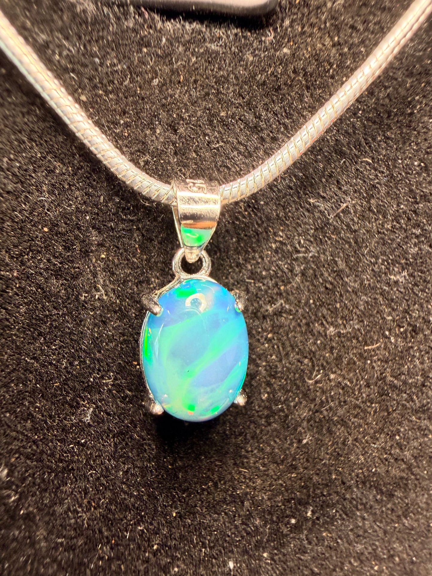Blue/green stripe pattern Ethiopian opal pendant