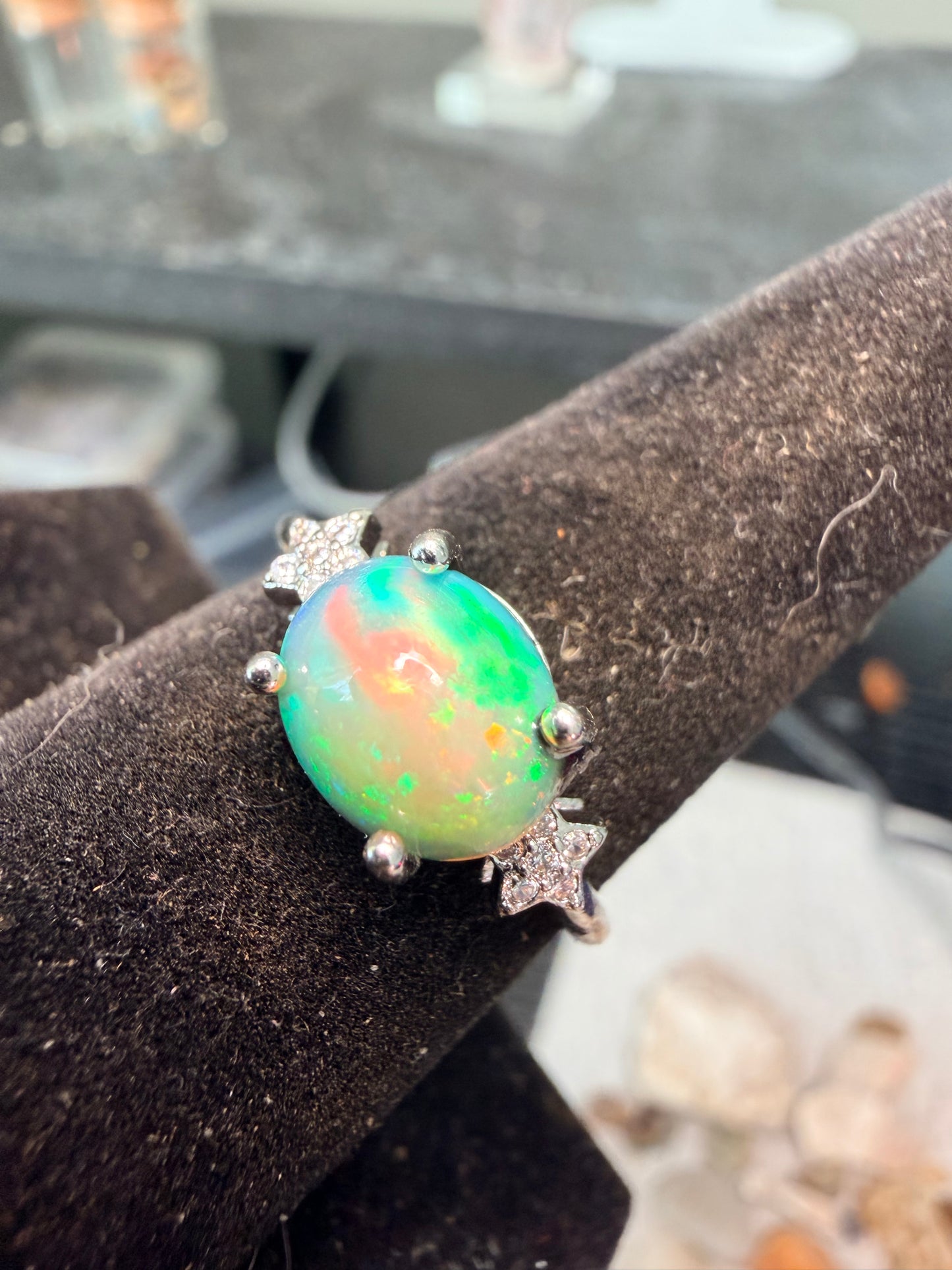 Ethiopian opal adjustable ring with green and orange flash