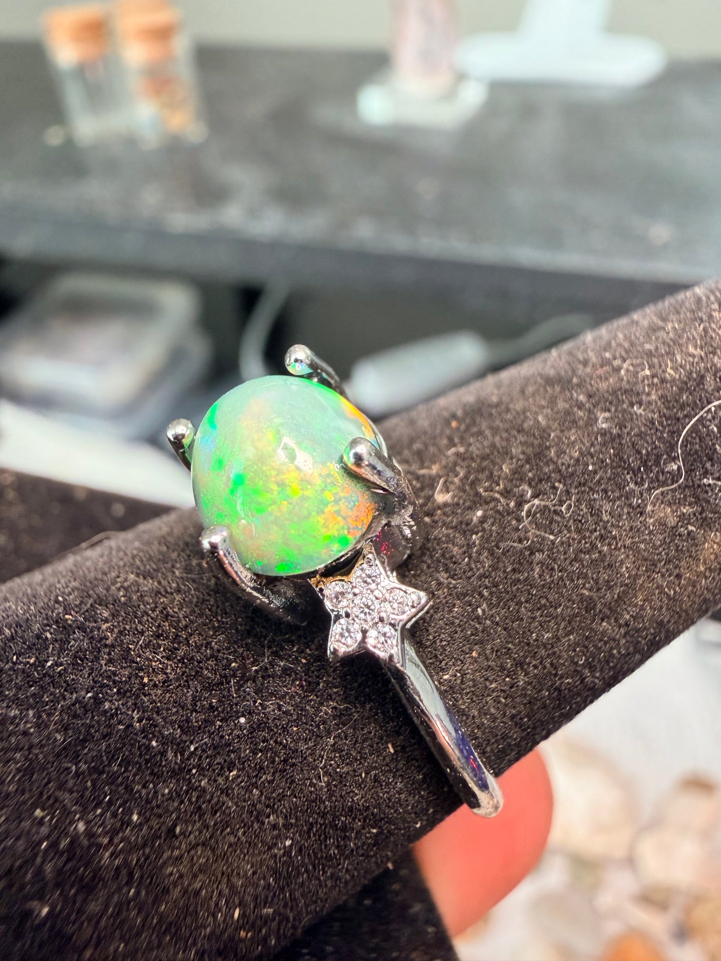 Ethiopian opal adjustable ring with green and orange flash