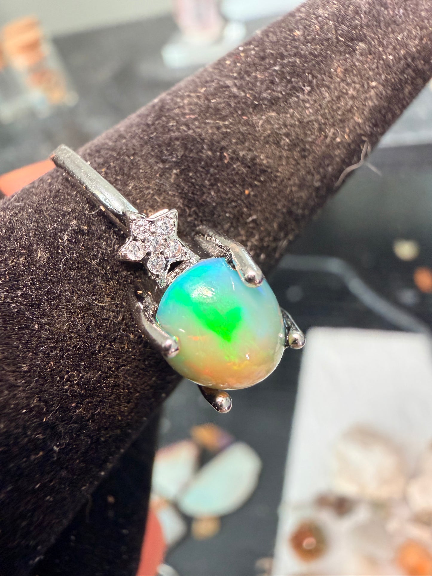 Ethiopian opal adjustable ring with green and orange flash
