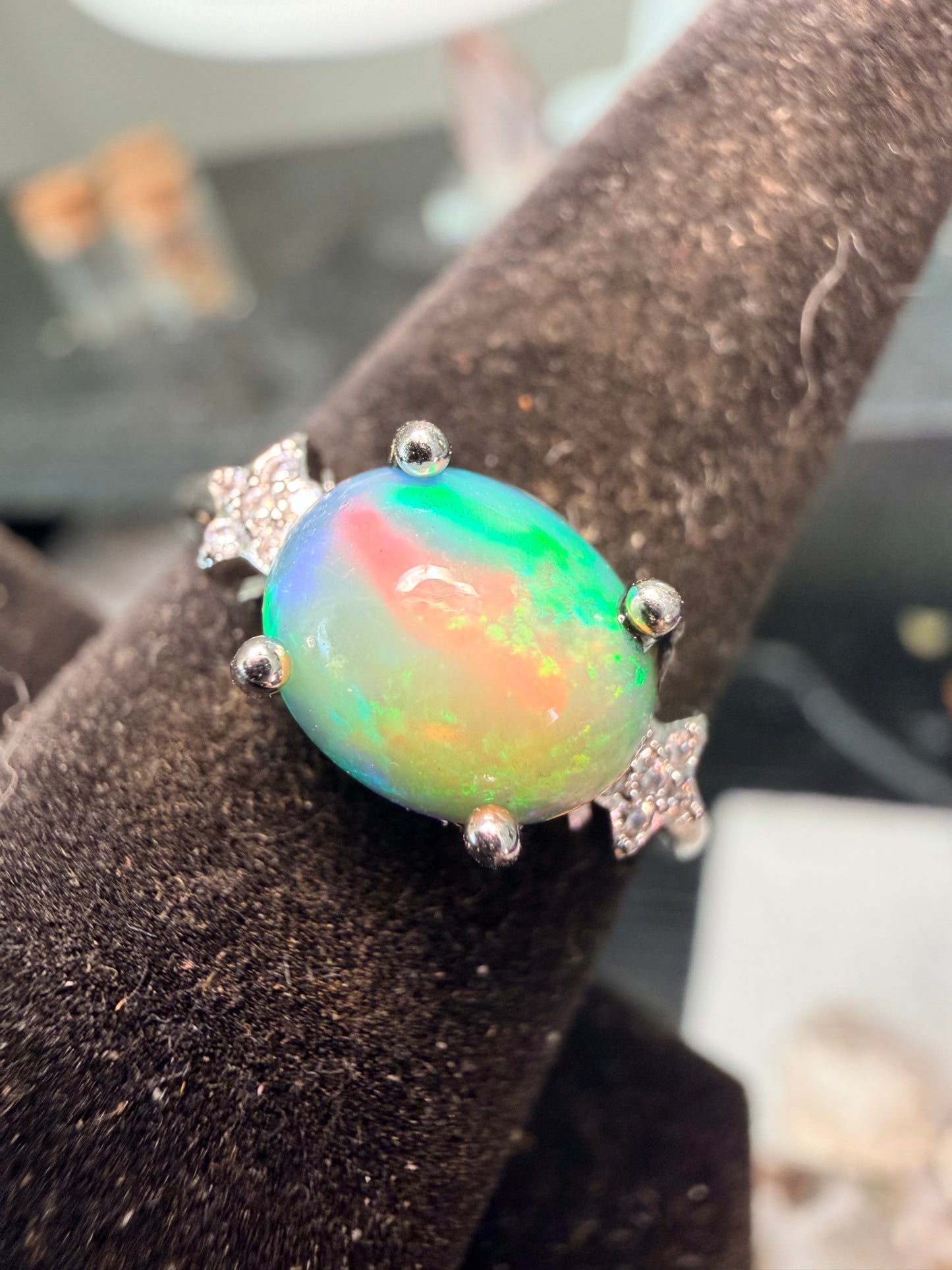 Ethiopian opal adjustable ring with green and orange flash
