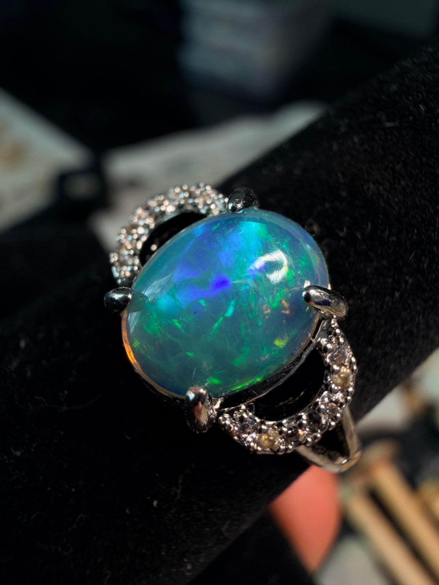 1.4 carat Ethiopian opal adjustable ring blue green flash