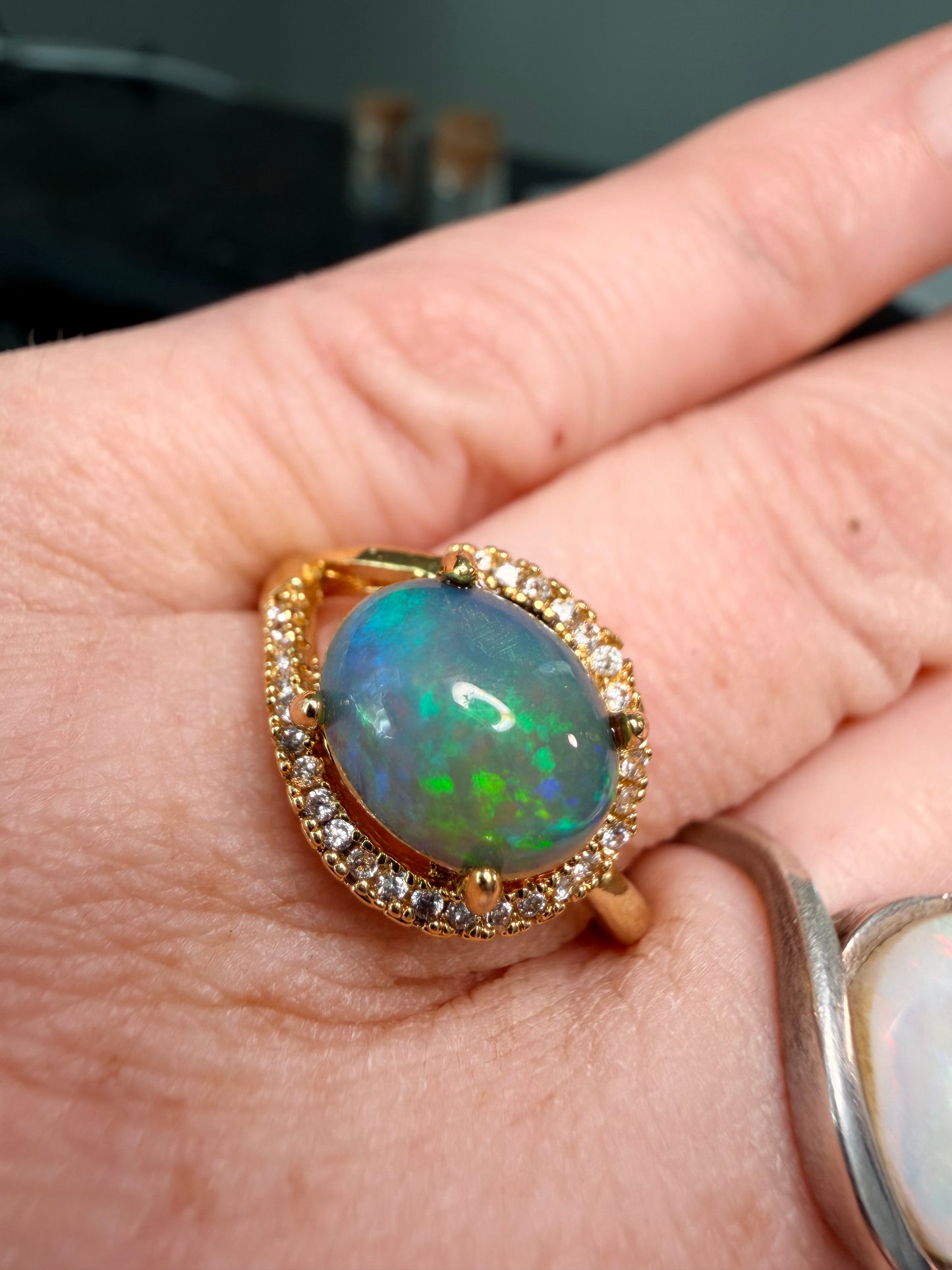 1.9 carat Ethiopian opal adjustable ring blue green flash
