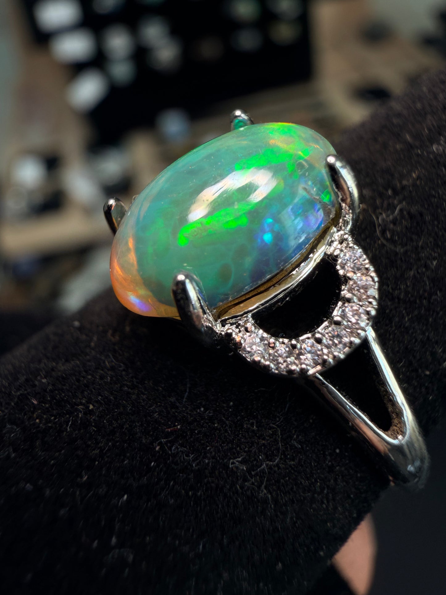 2.1 carat Ethiopian opal adjustable ring green base