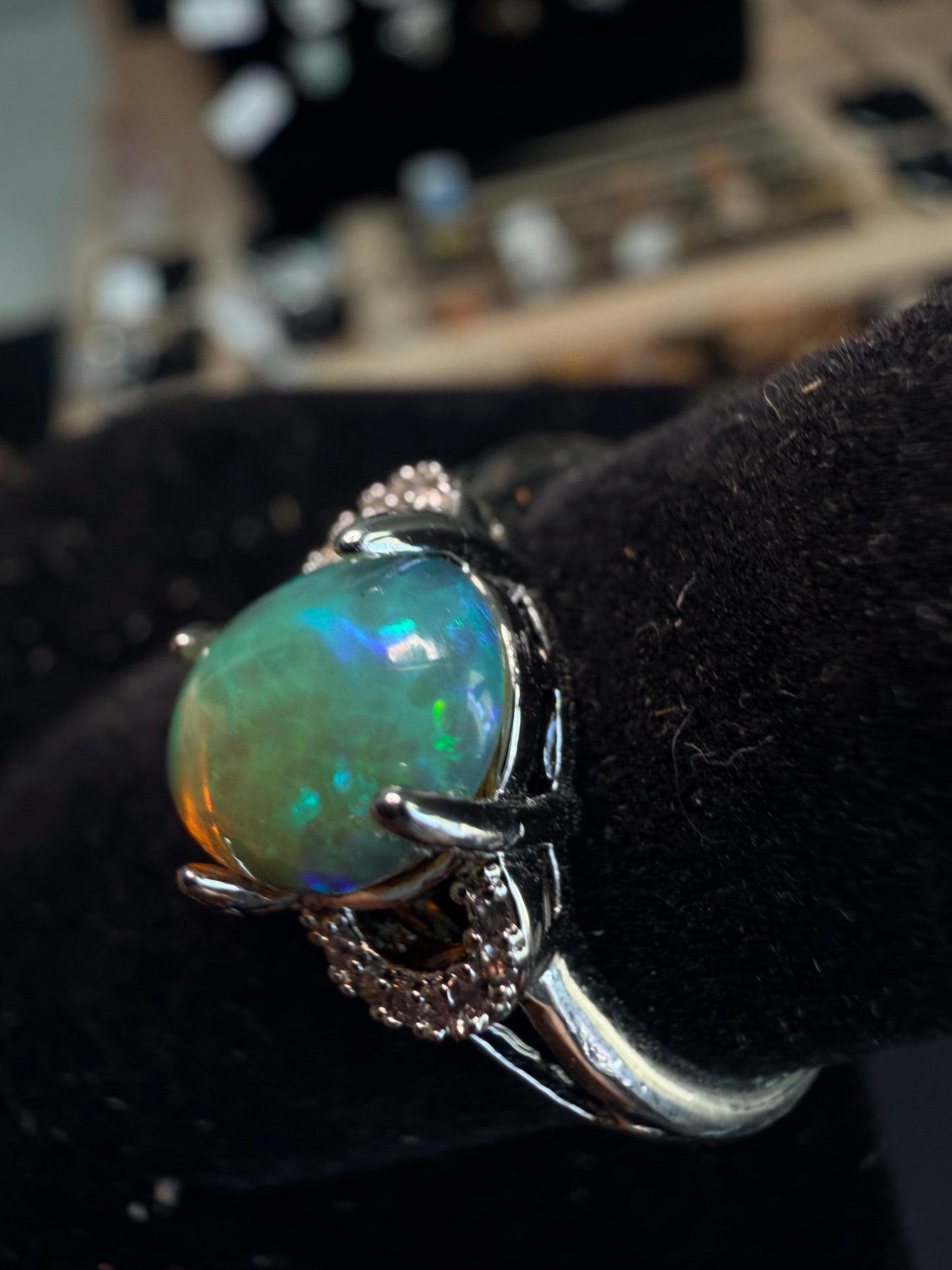 2.1 carat Ethiopian opal adjustable ring green base