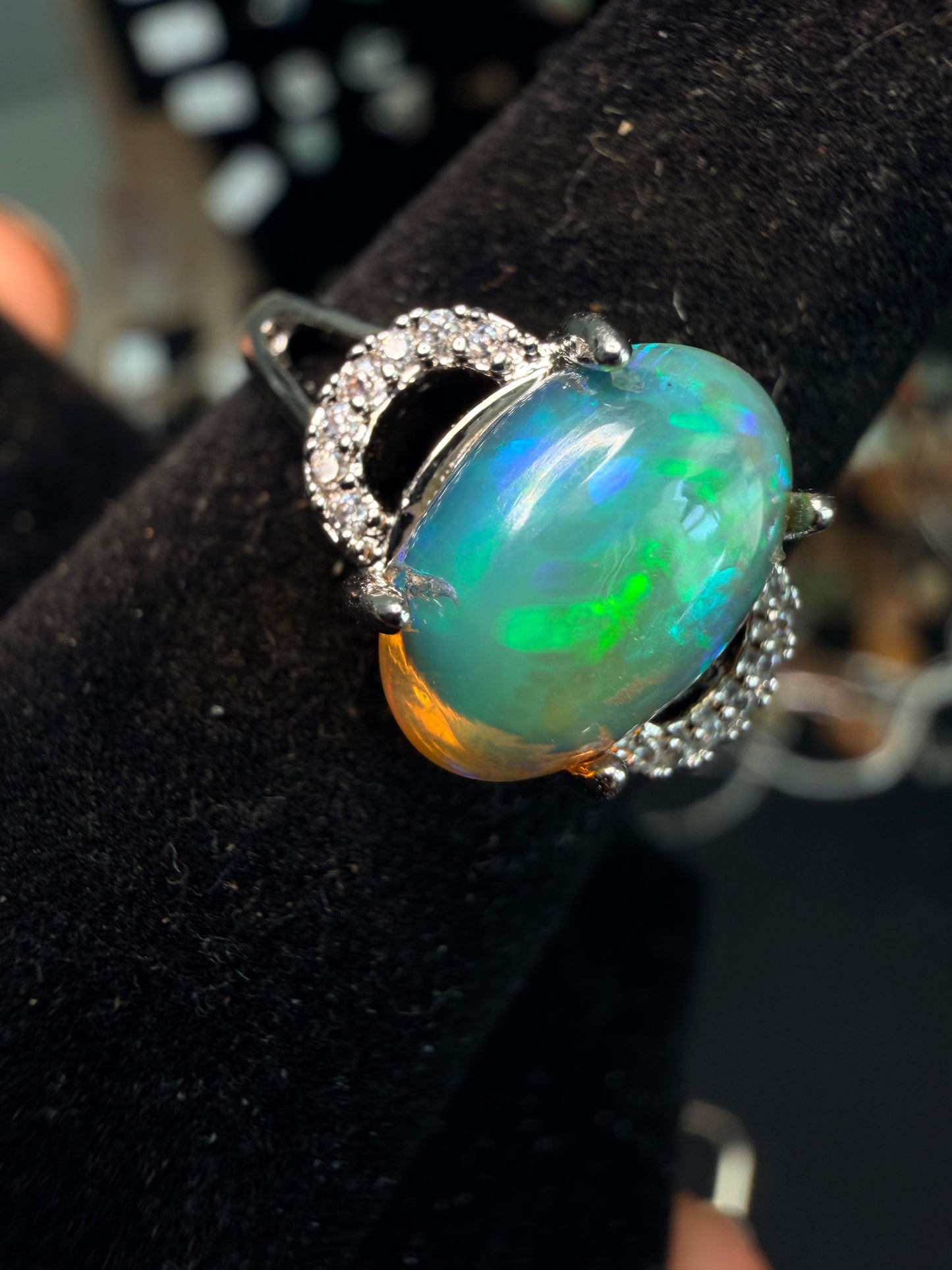 2.1 carat Ethiopian opal adjustable ring green base