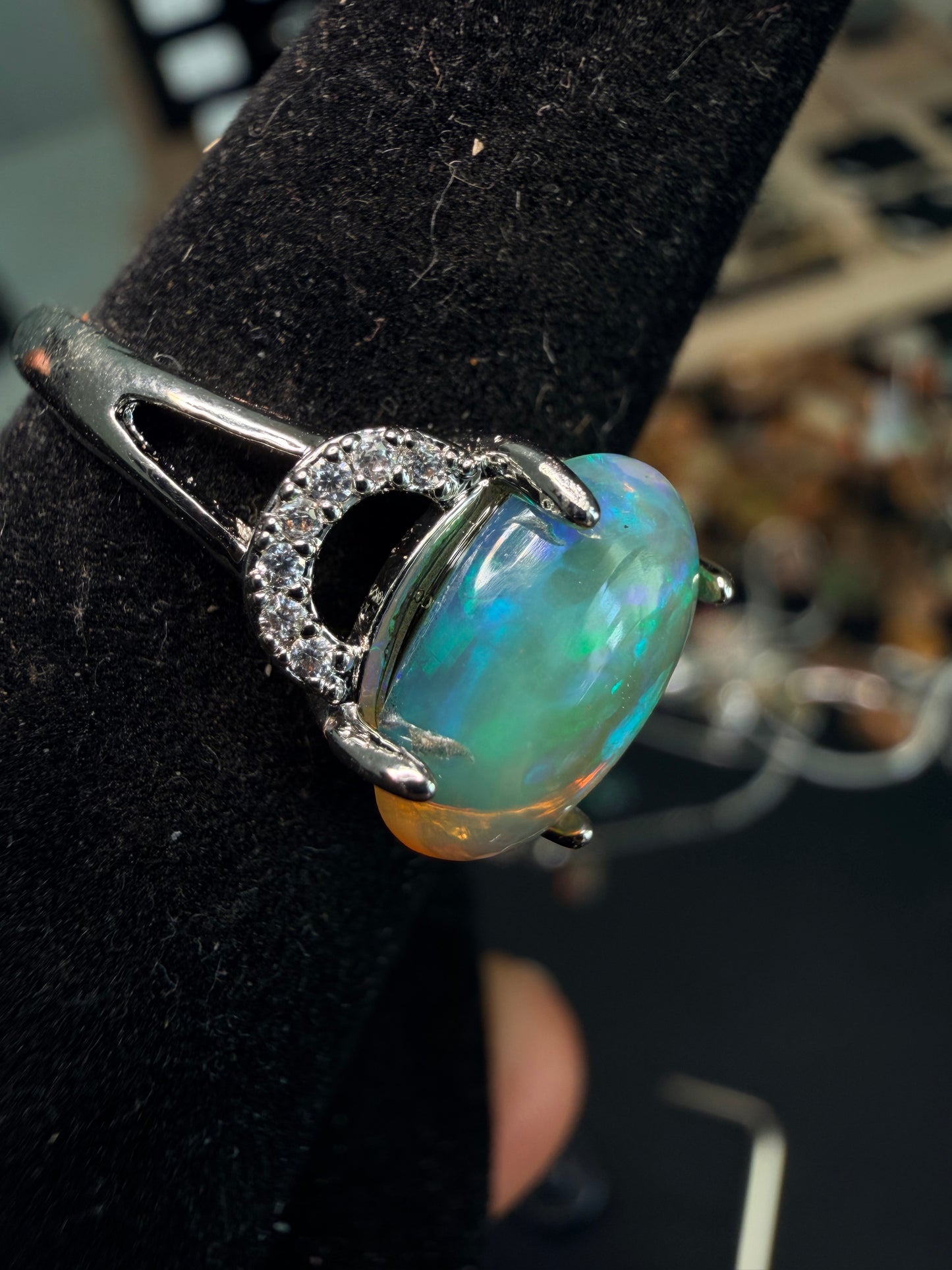 2.1 carat Ethiopian opal adjustable ring green base