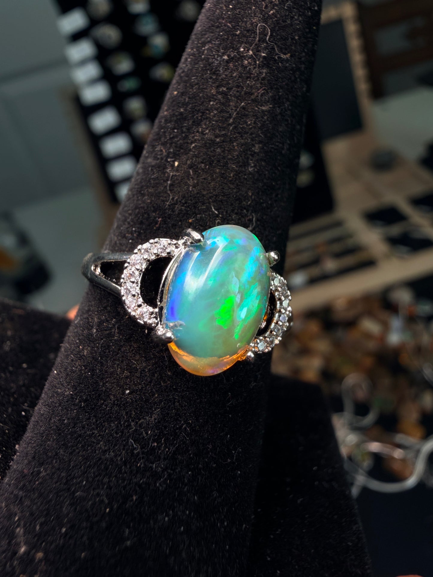 2.1 carat Ethiopian opal adjustable ring green base