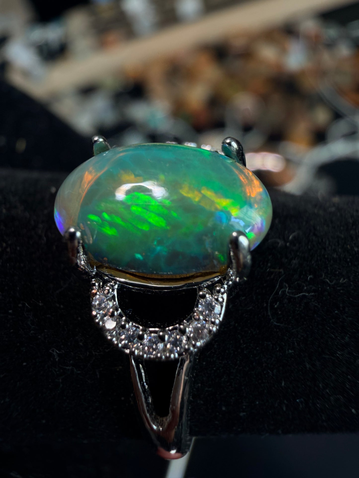 2.1 carat Ethiopian opal adjustable ring green base