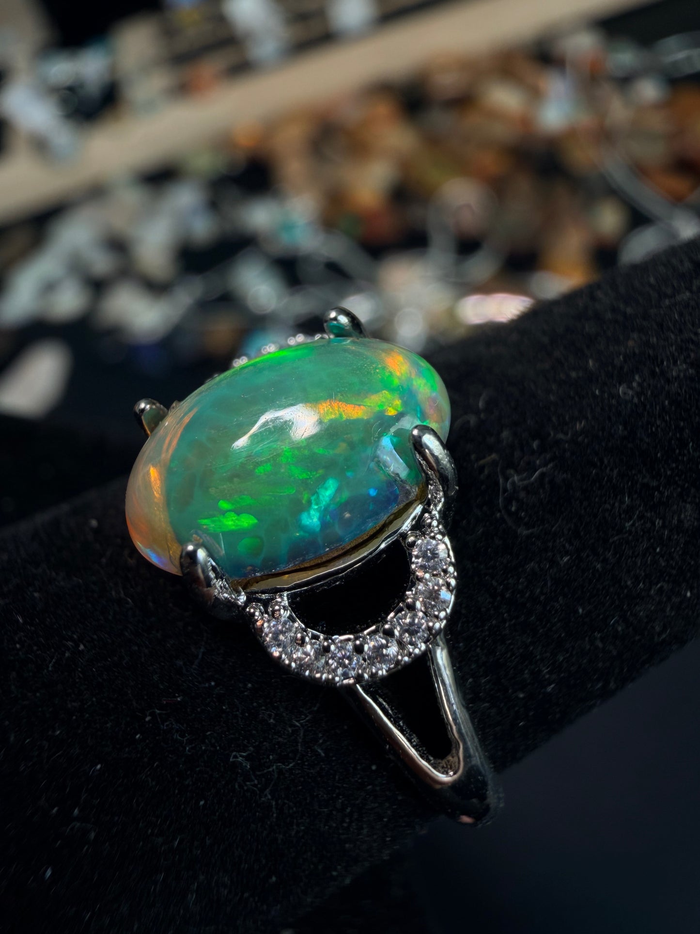2.1 carat Ethiopian opal adjustable ring green base