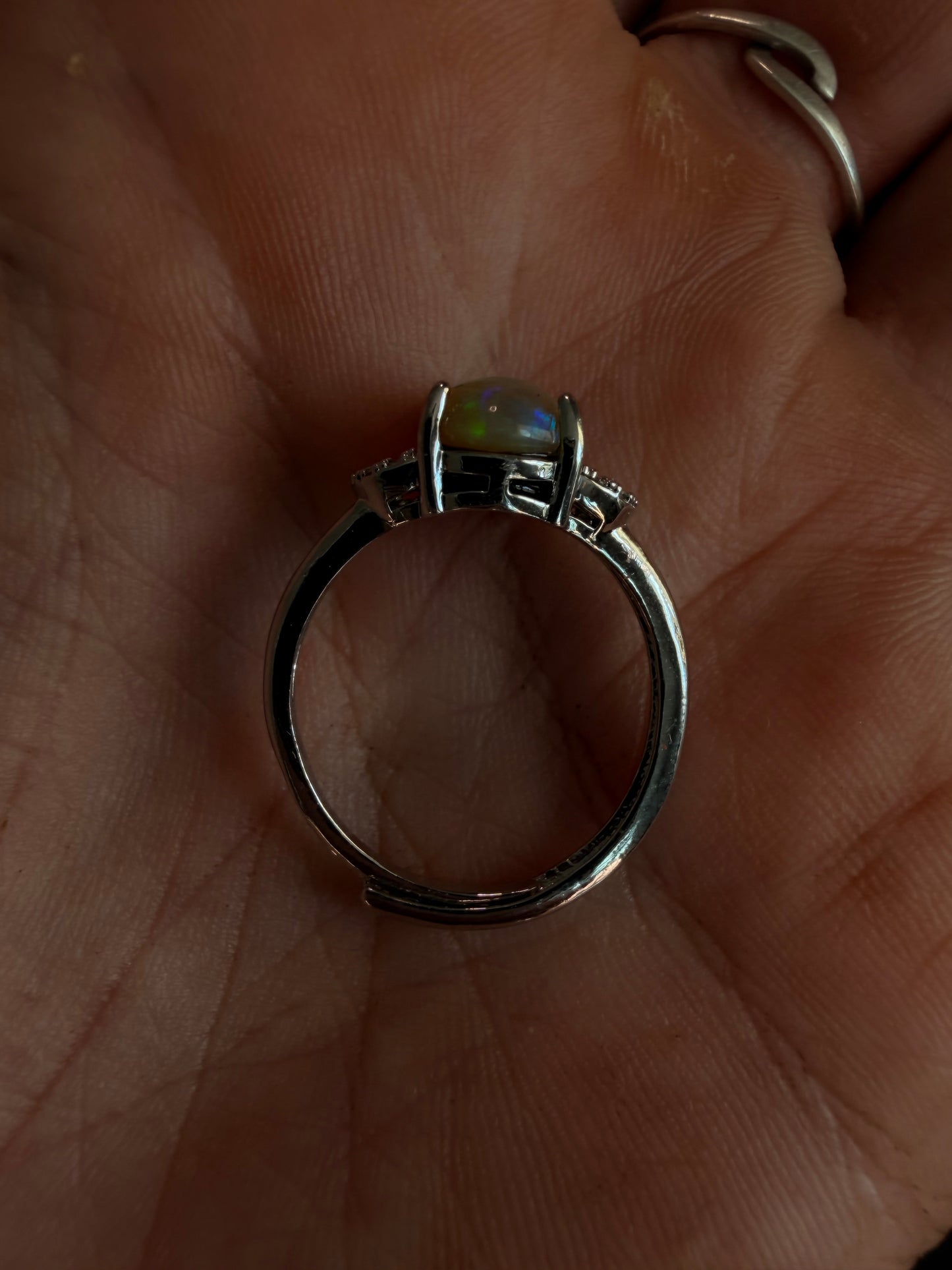 2.1 carat Ethiopian opal adjustable ring green base