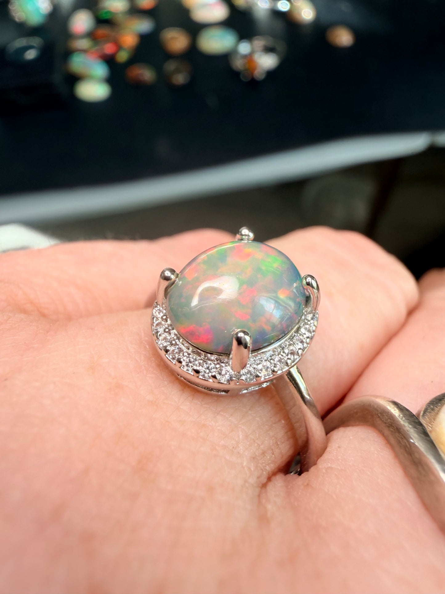 2.2 carat Ethiopian opal adjustable ring dark base