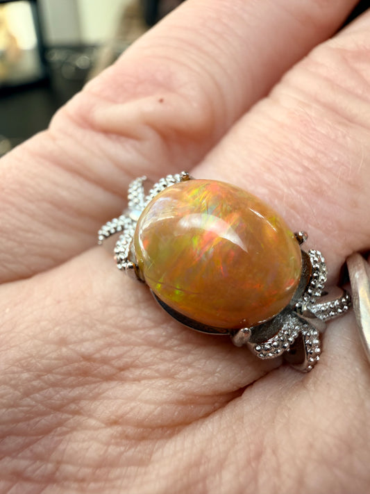 2.9 carat Ethiopian opal adjustable ring orange