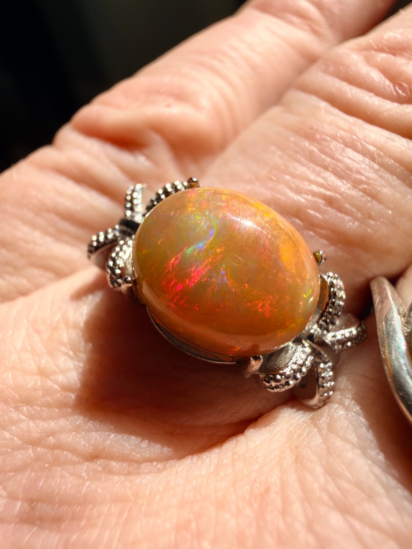 2.9 carat Ethiopian opal adjustable ring orange