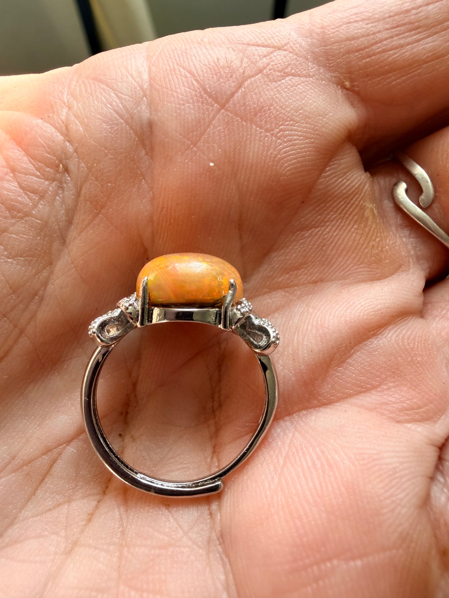 2.9 carat Ethiopian opal adjustable ring orange