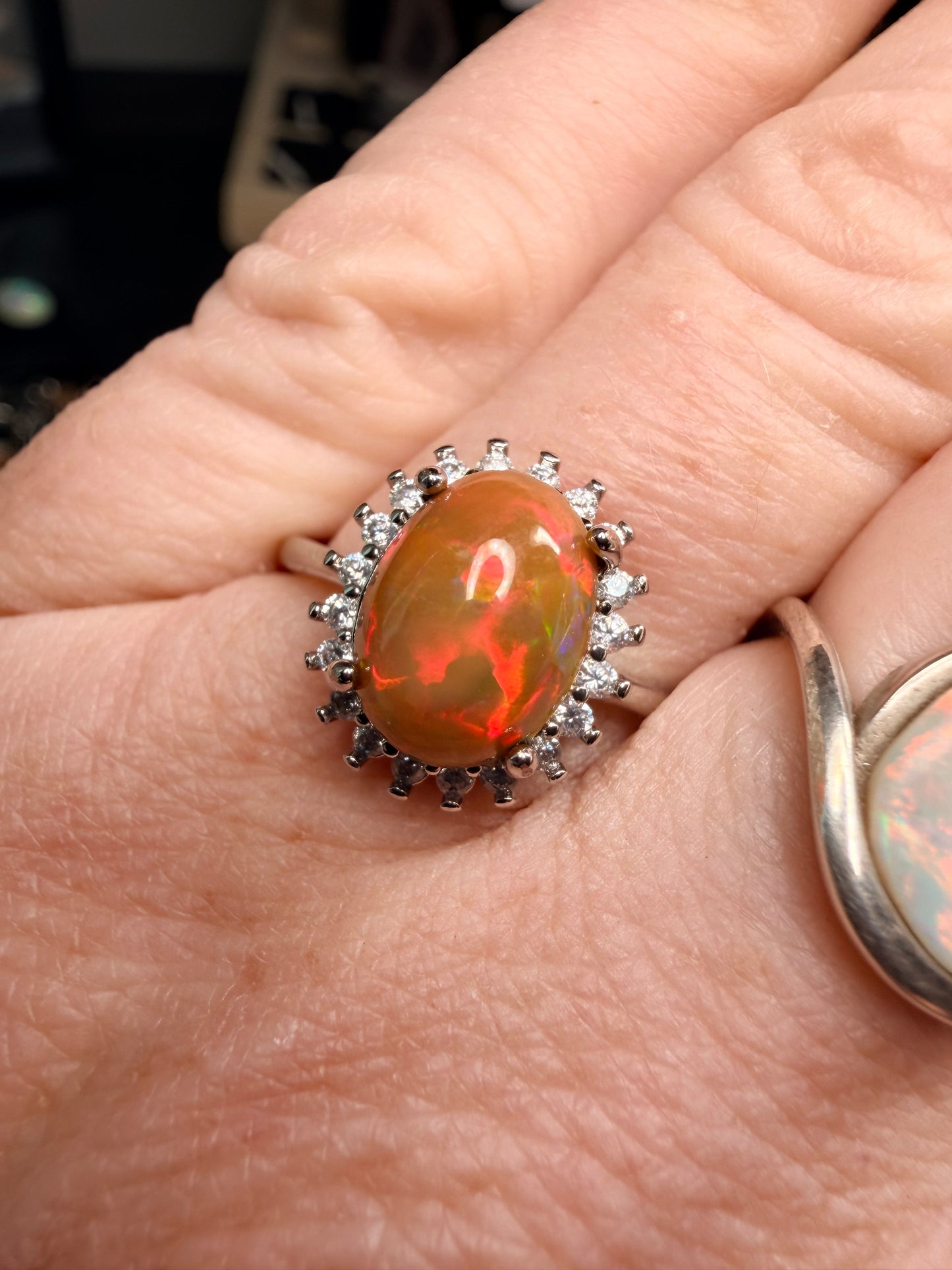 2.4 carat Ethiopian opal adjustable ring dark base