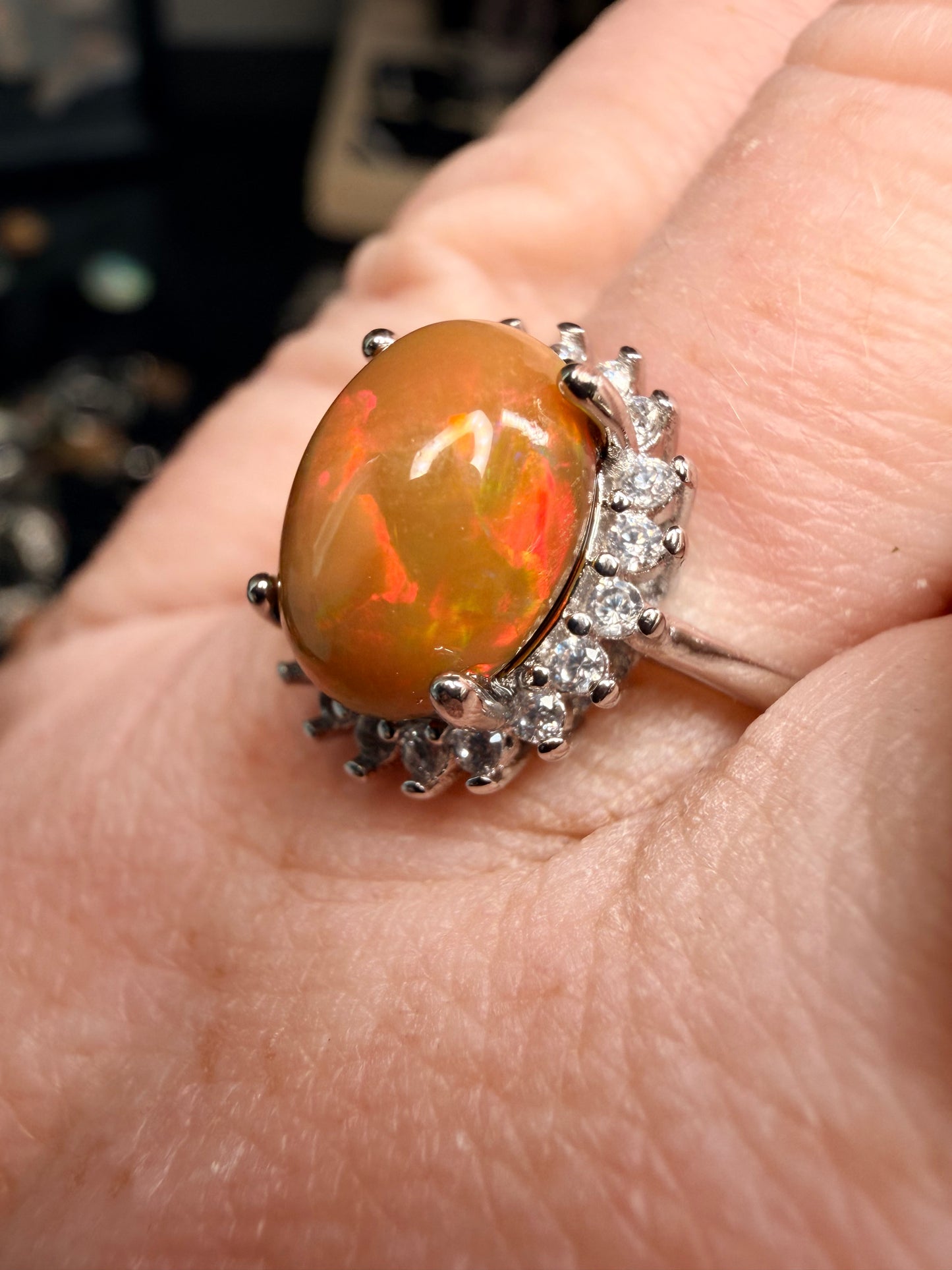 2.4 carat Ethiopian opal adjustable ring dark base