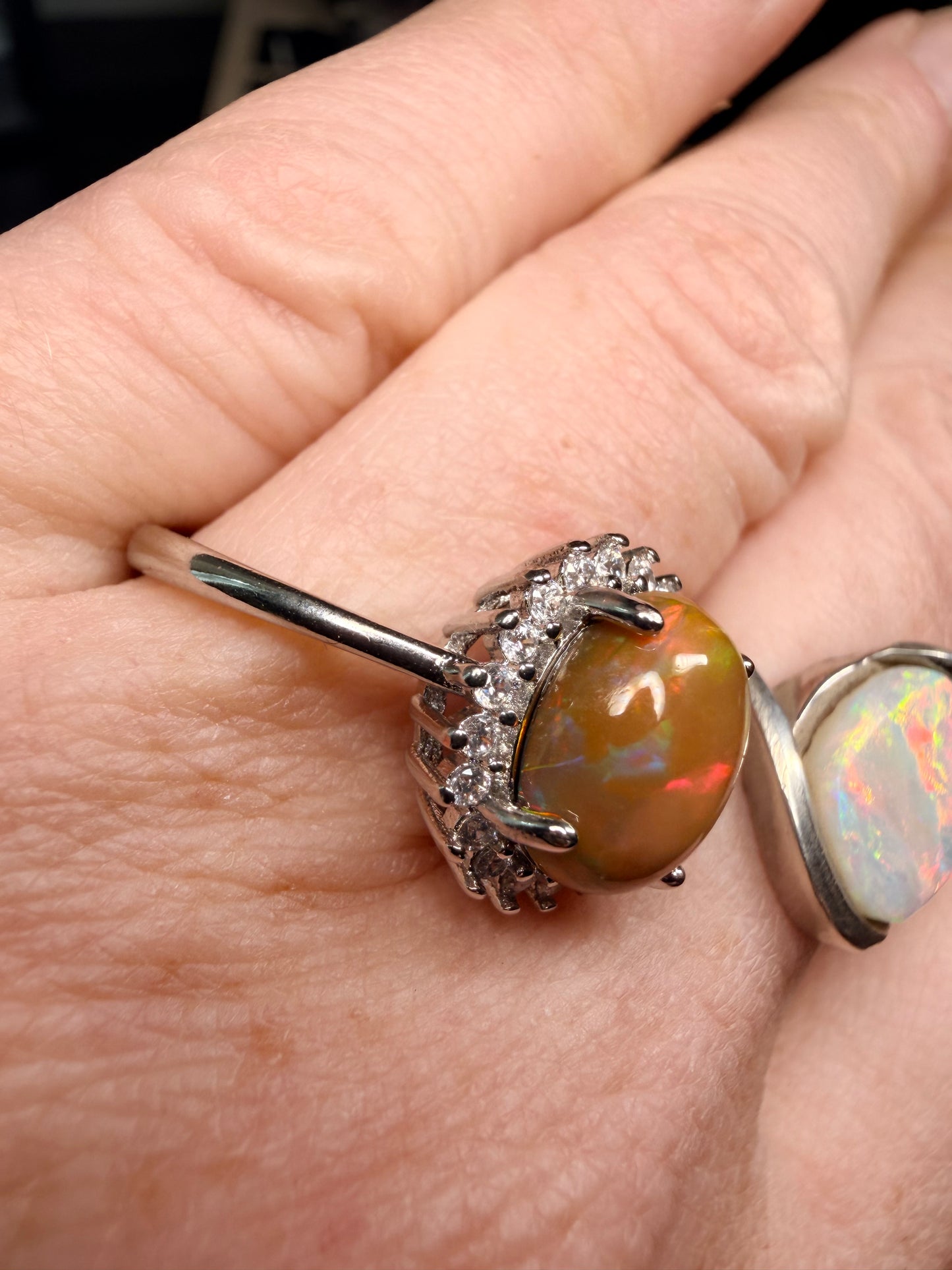 2.4 carat Ethiopian opal adjustable ring dark base