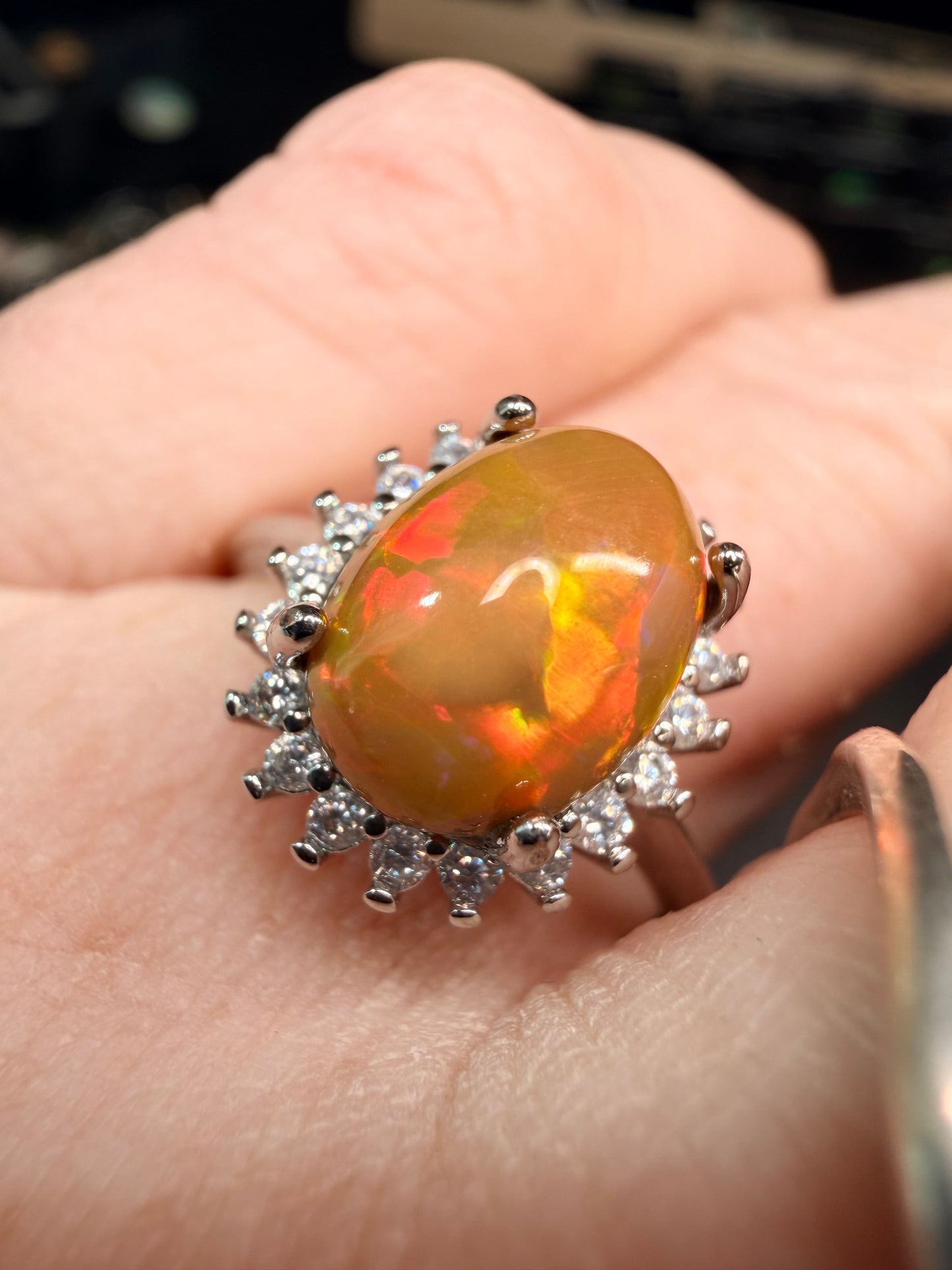 2.4 carat Ethiopian opal adjustable ring dark base