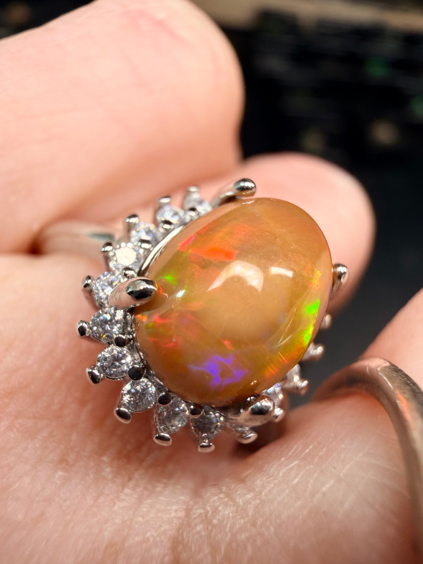 2.4 carat Ethiopian opal adjustable ring dark base