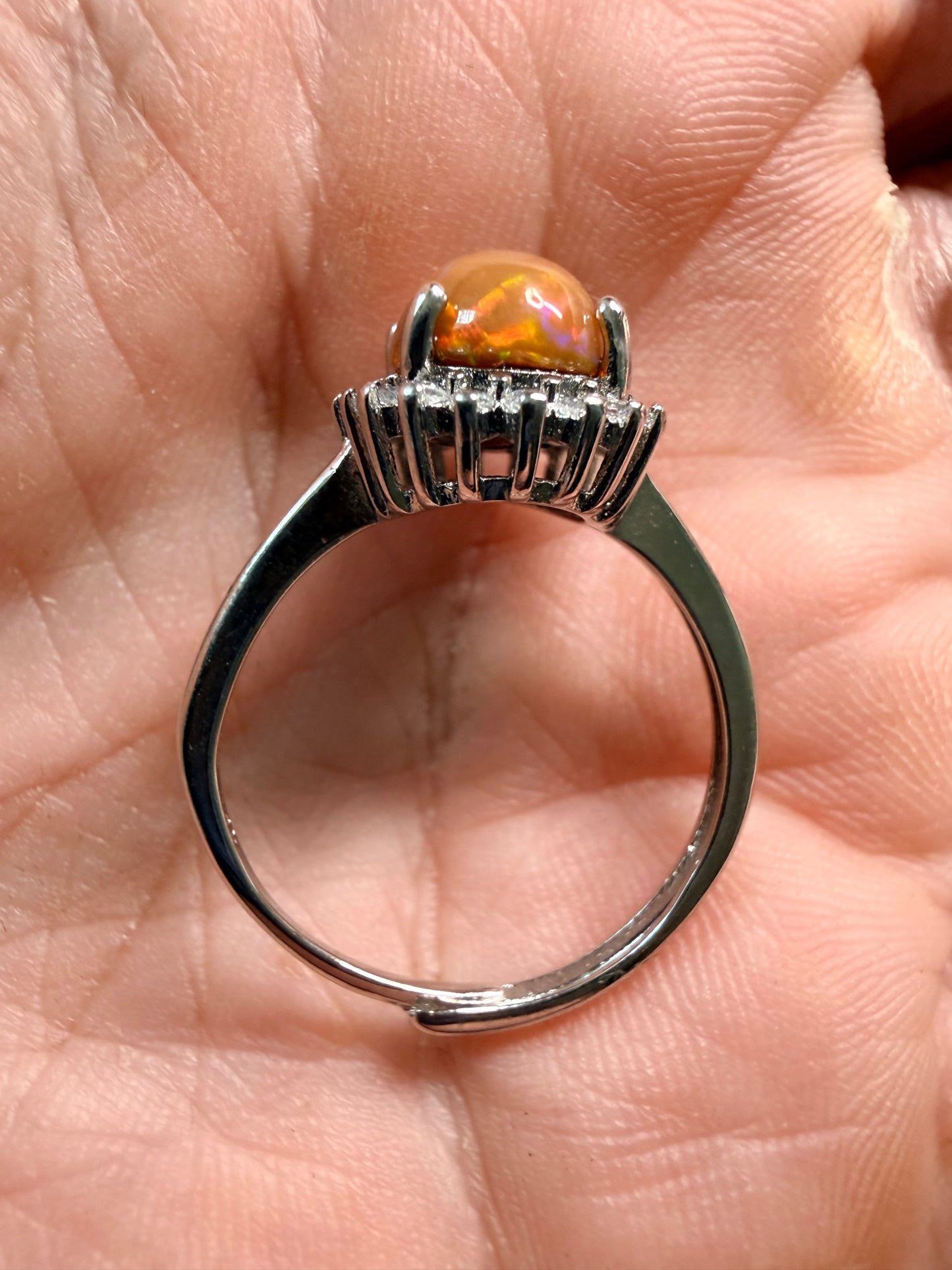 2.4 carat Ethiopian opal adjustable ring dark base