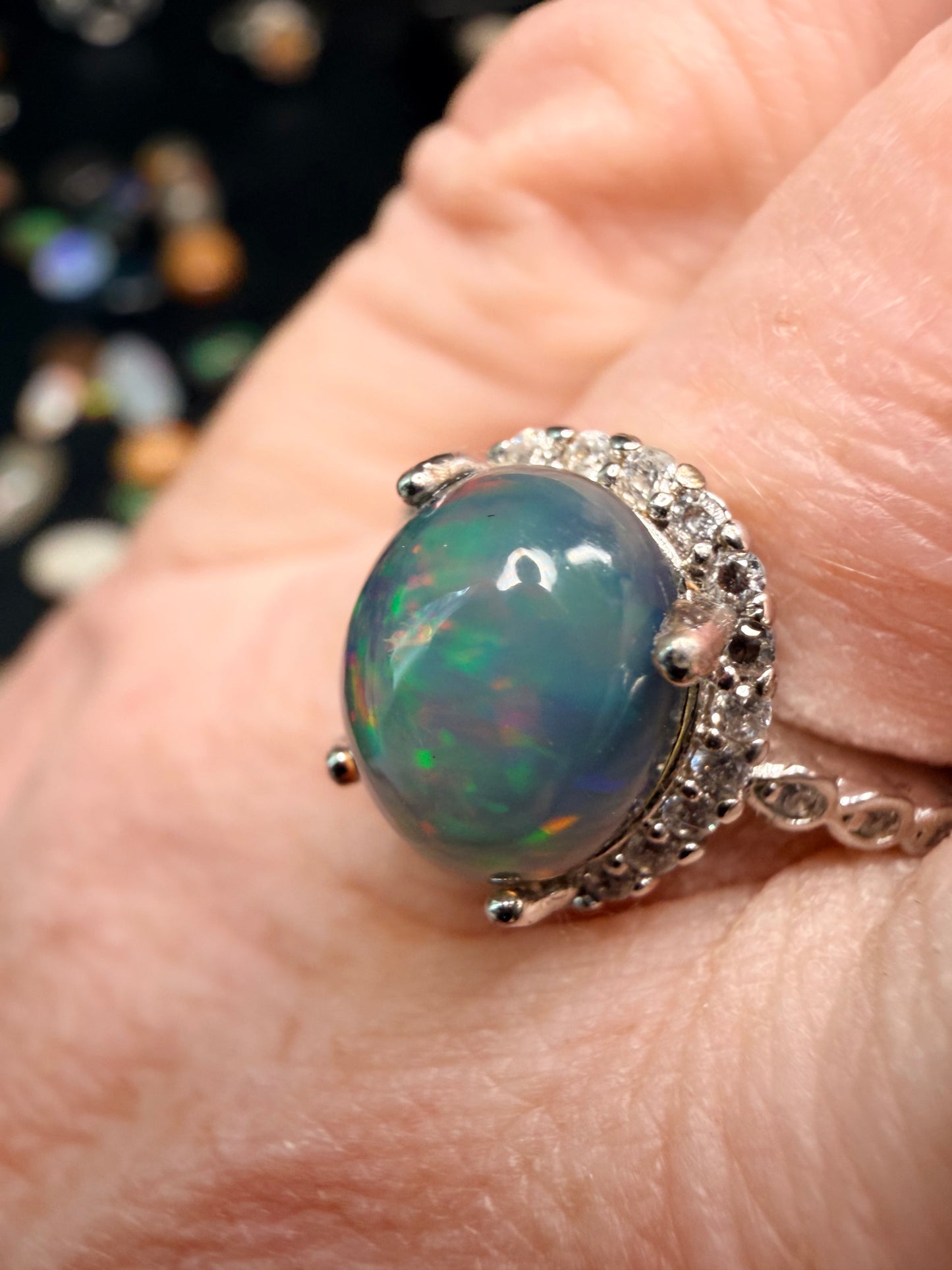 2.2 carat Ethiopian opal adjustable ring confetti