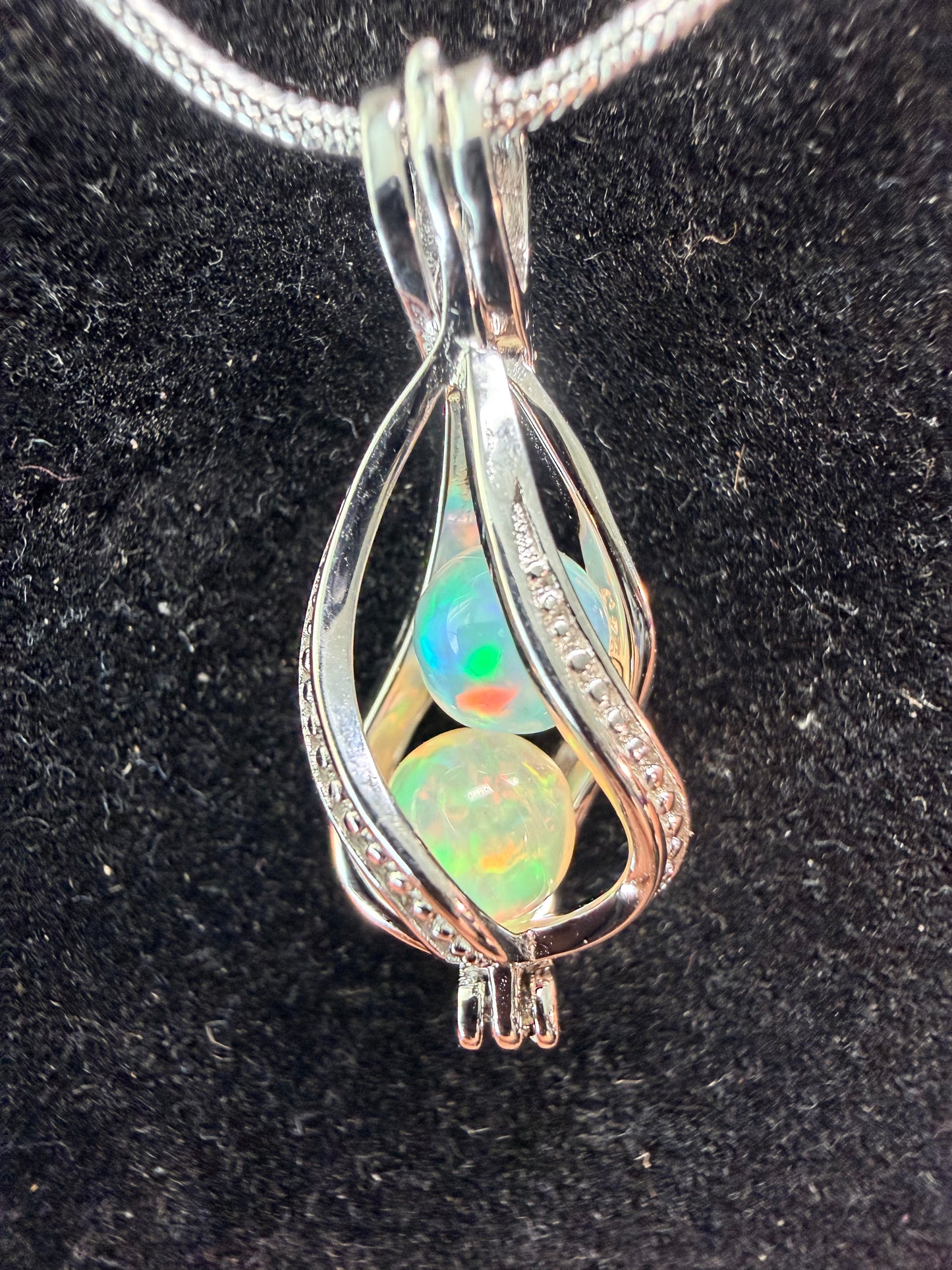 2 carat Ethiopian opal sphere necklace with sterling silver snake chain