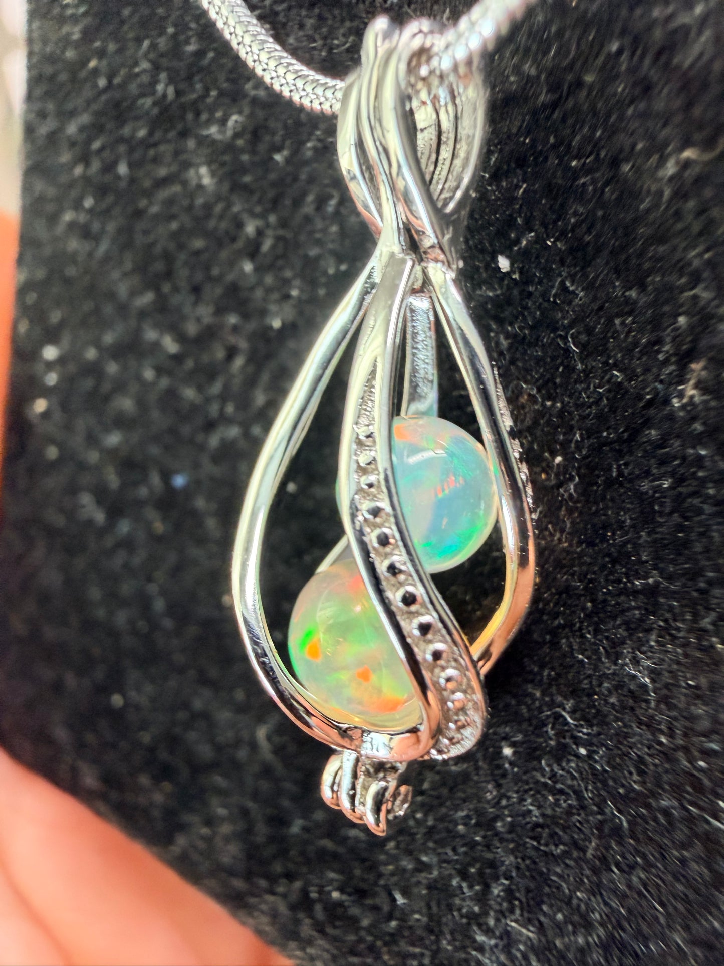 2 carat Ethiopian opal sphere necklace with sterling silver snake chain