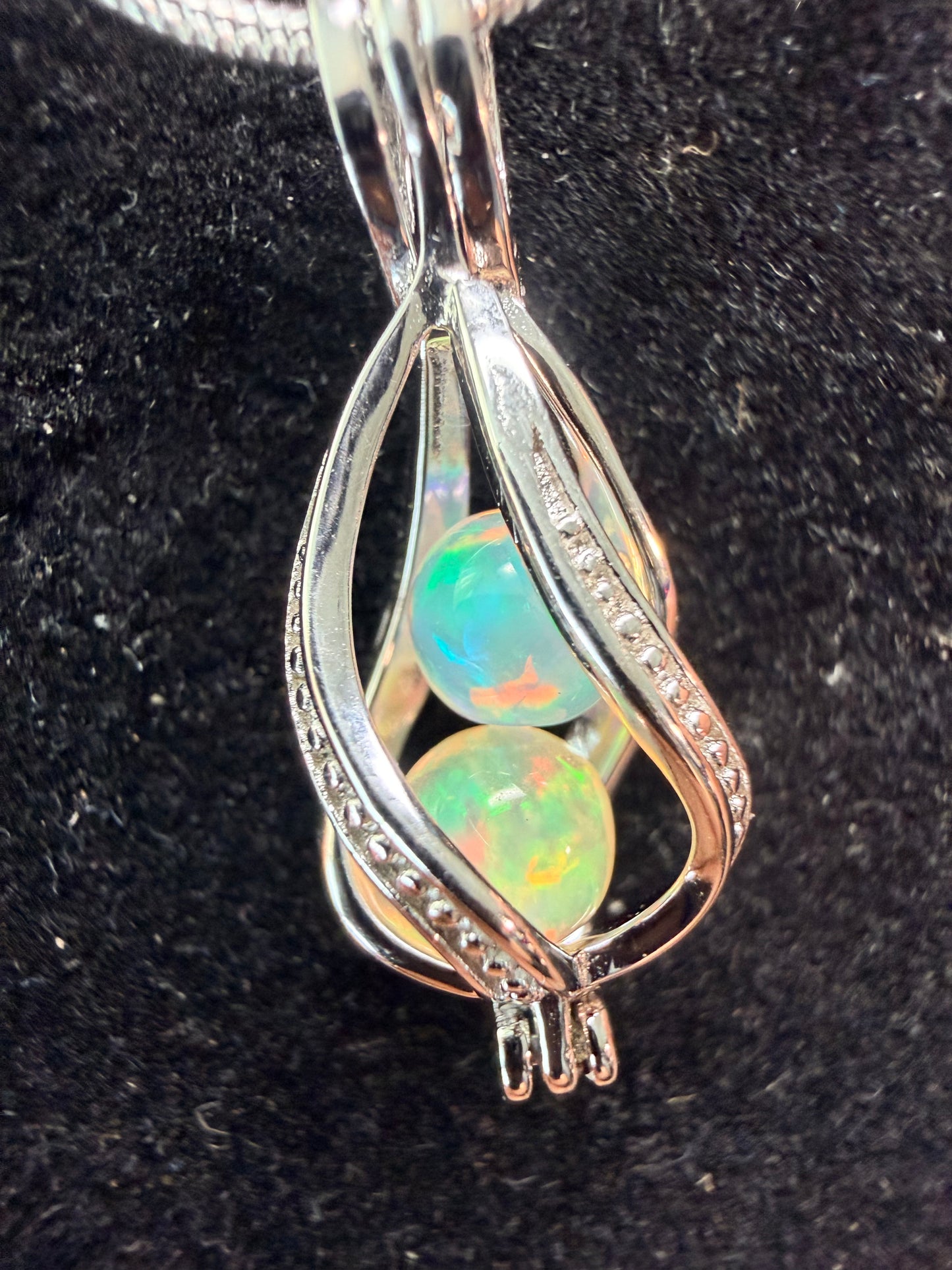 2 carat Ethiopian opal sphere necklace with sterling silver snake chain