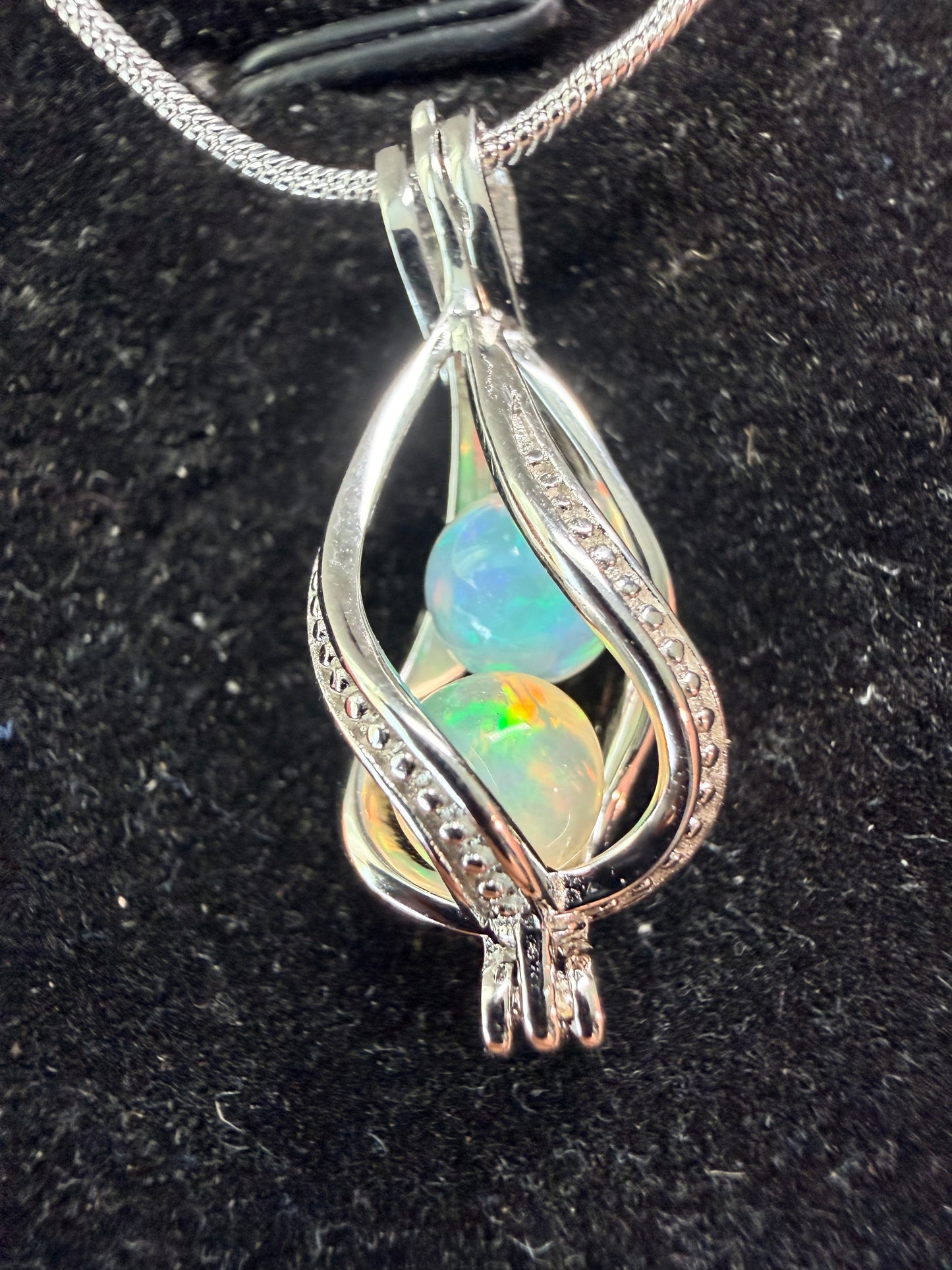 2 carat Ethiopian opal sphere necklace with sterling silver snake chain