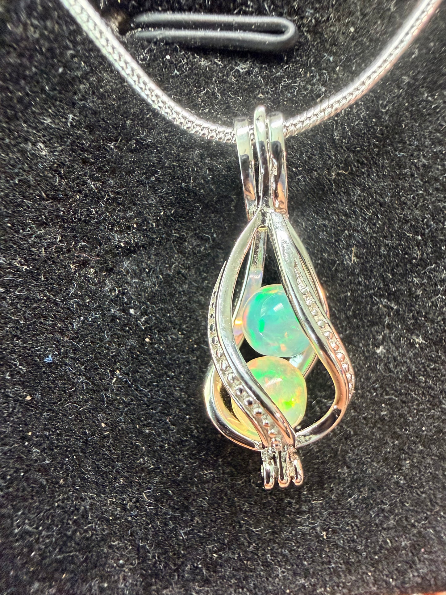 2 carat Ethiopian opal sphere necklace with sterling silver snake chain