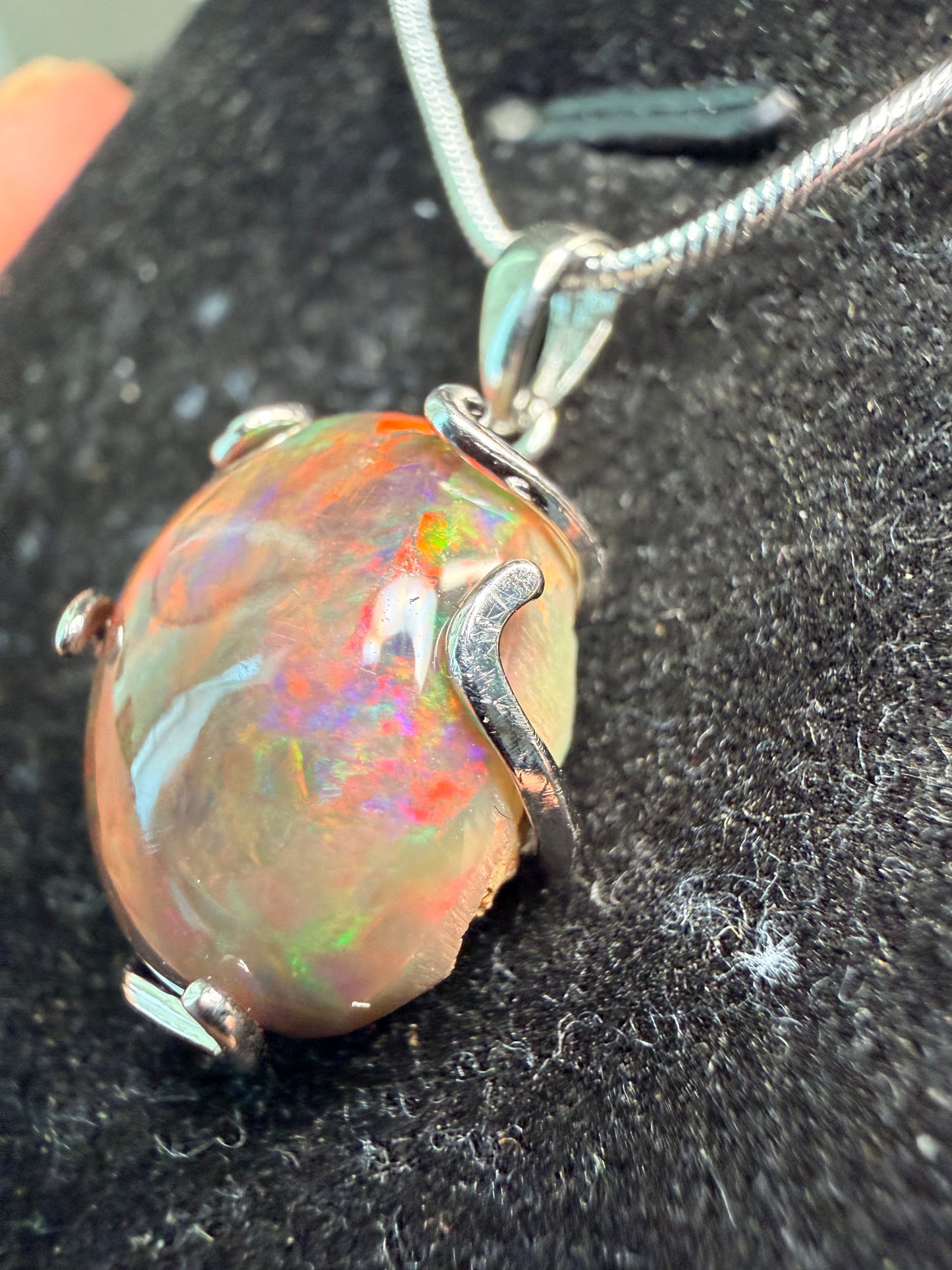 7.2 carat Ethiopian opal Freeform pendant in sterling silver