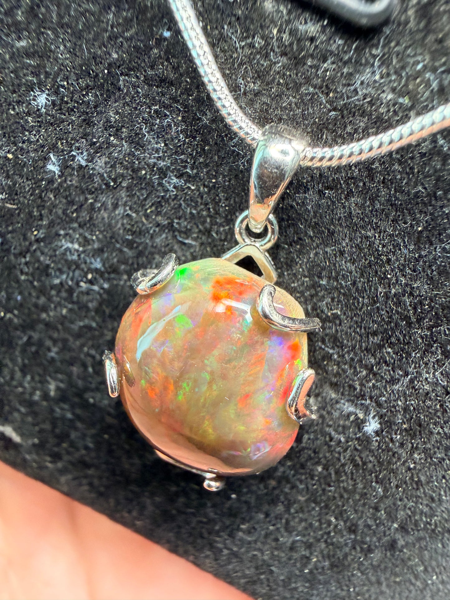 7.2 carat Ethiopian opal Freeform pendant in sterling silver