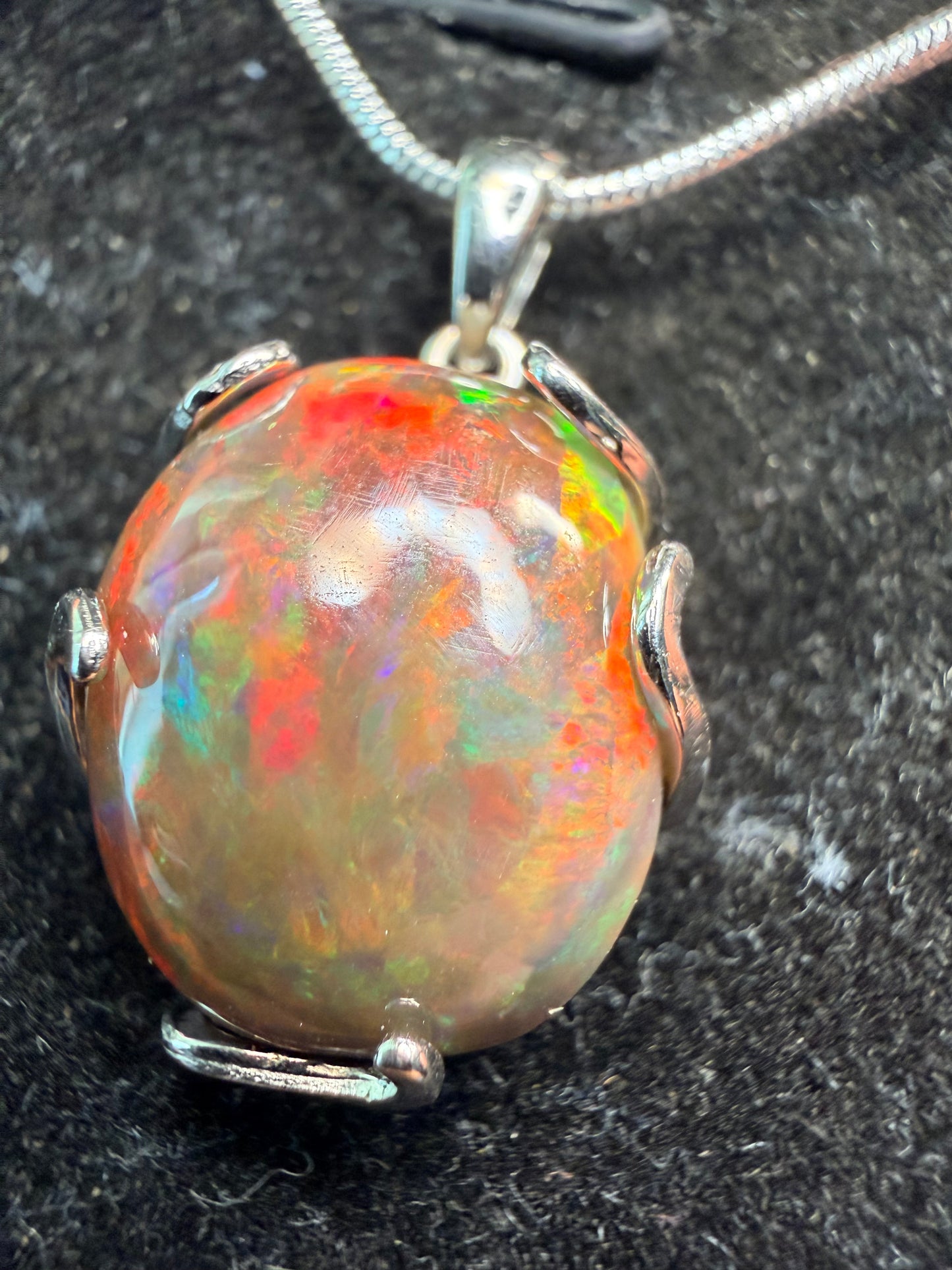 7.2 carat Ethiopian opal Freeform pendant in sterling silver