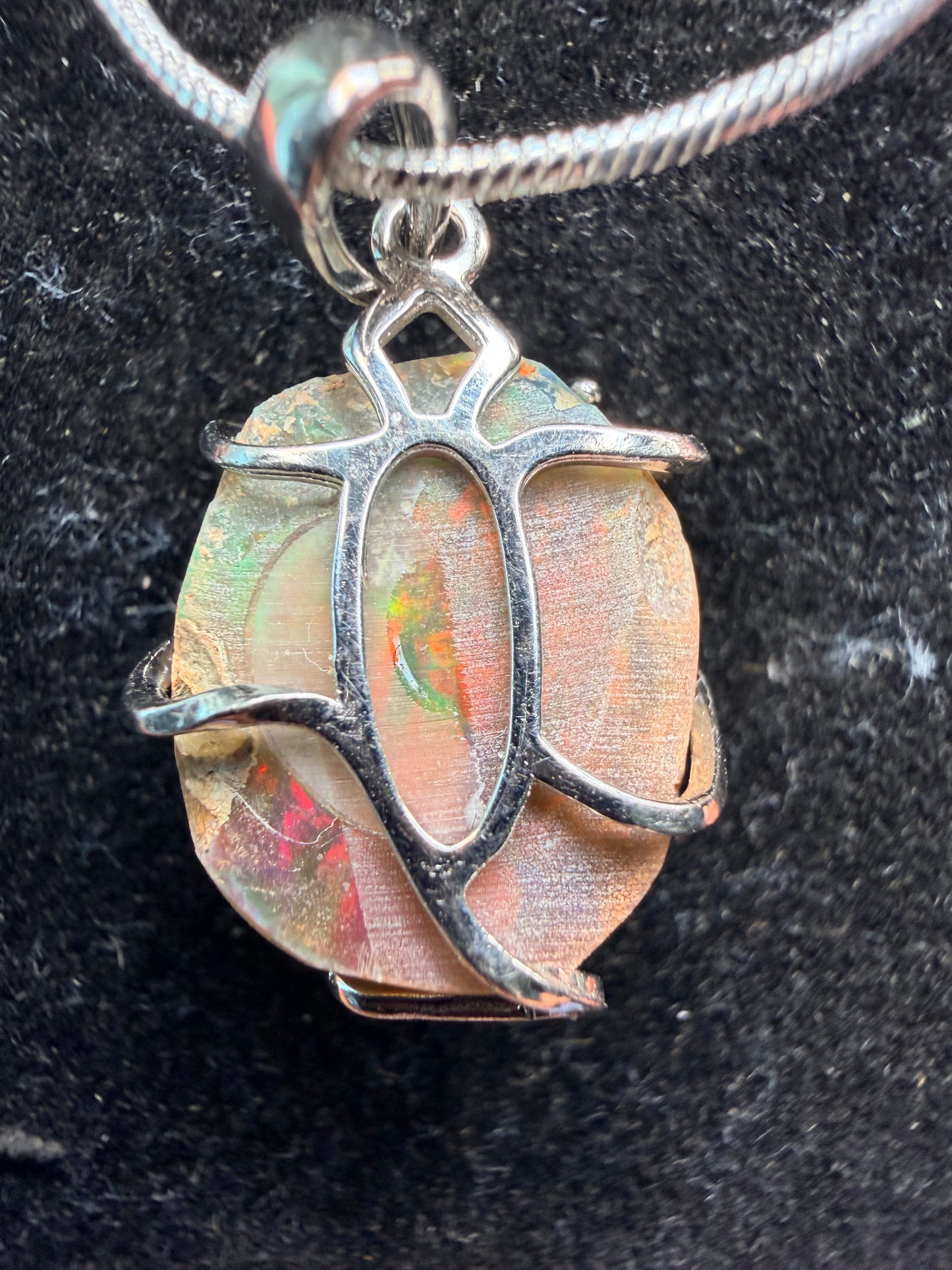 7.2 carat Ethiopian opal Freeform pendant in sterling silver