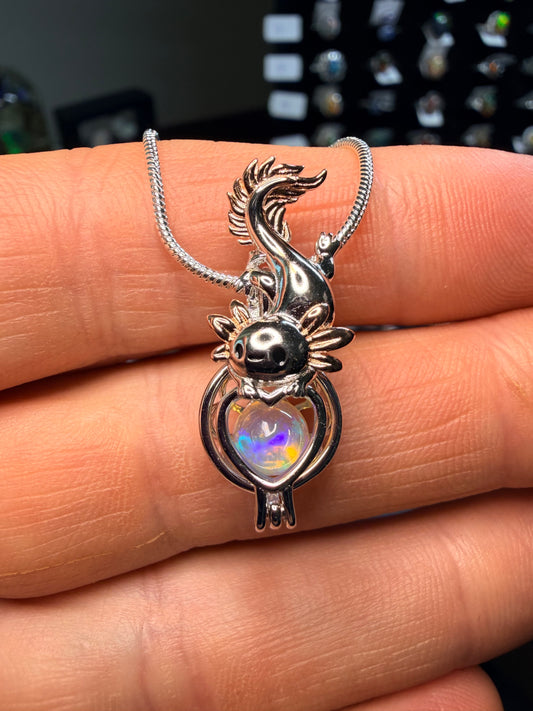 Axolotl pendant containing a 1 carat Ethiopian opal sphere and sterling silver snake chain