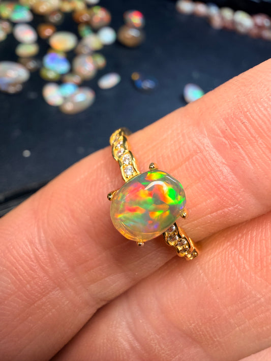 7.7mm x 6.1mm Ethiopian opal adjustable Ring in 925 gold setting