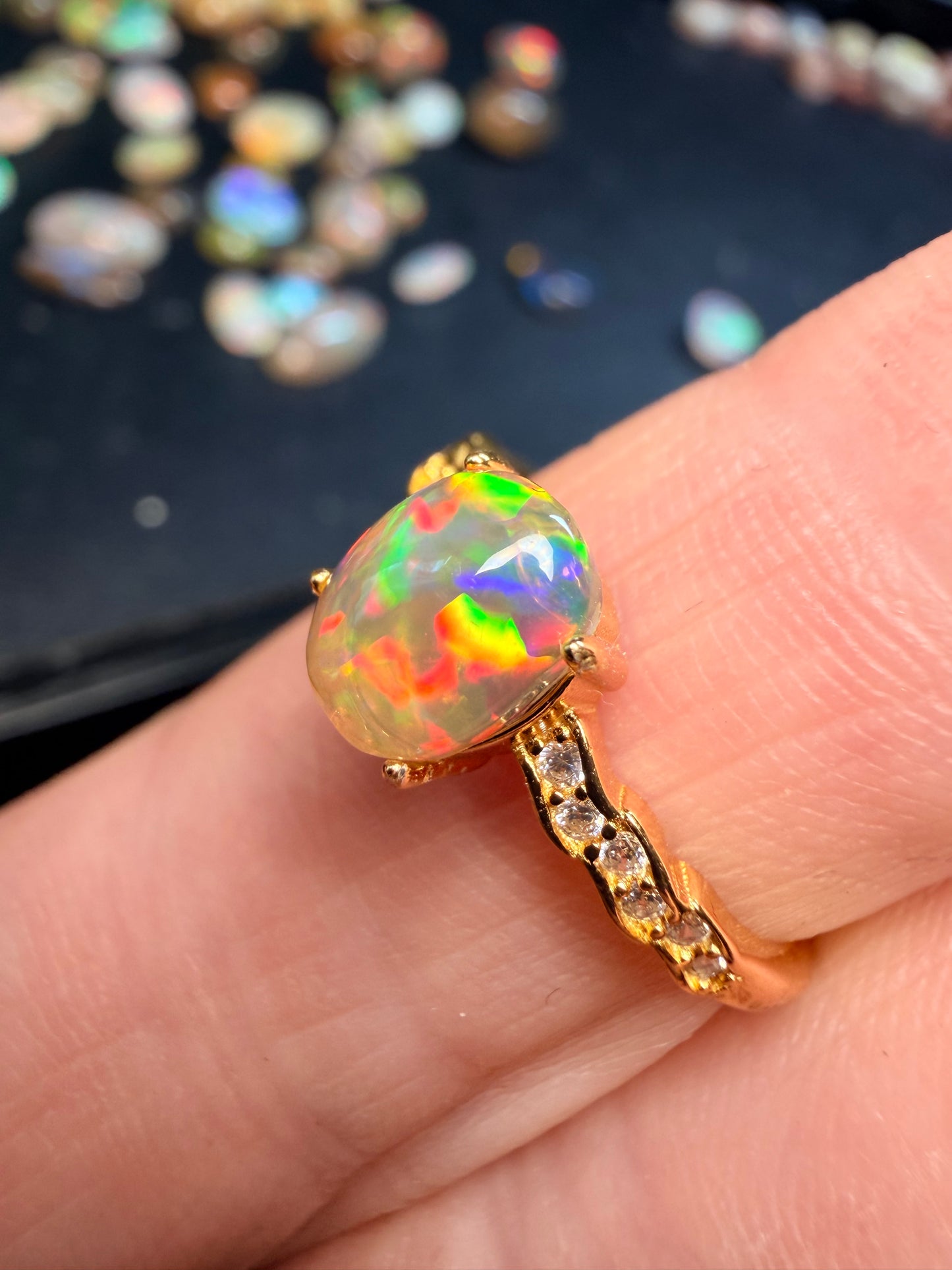 7.7mm x 6.1mm Ethiopian opal adjustable Ring in 925 gold setting